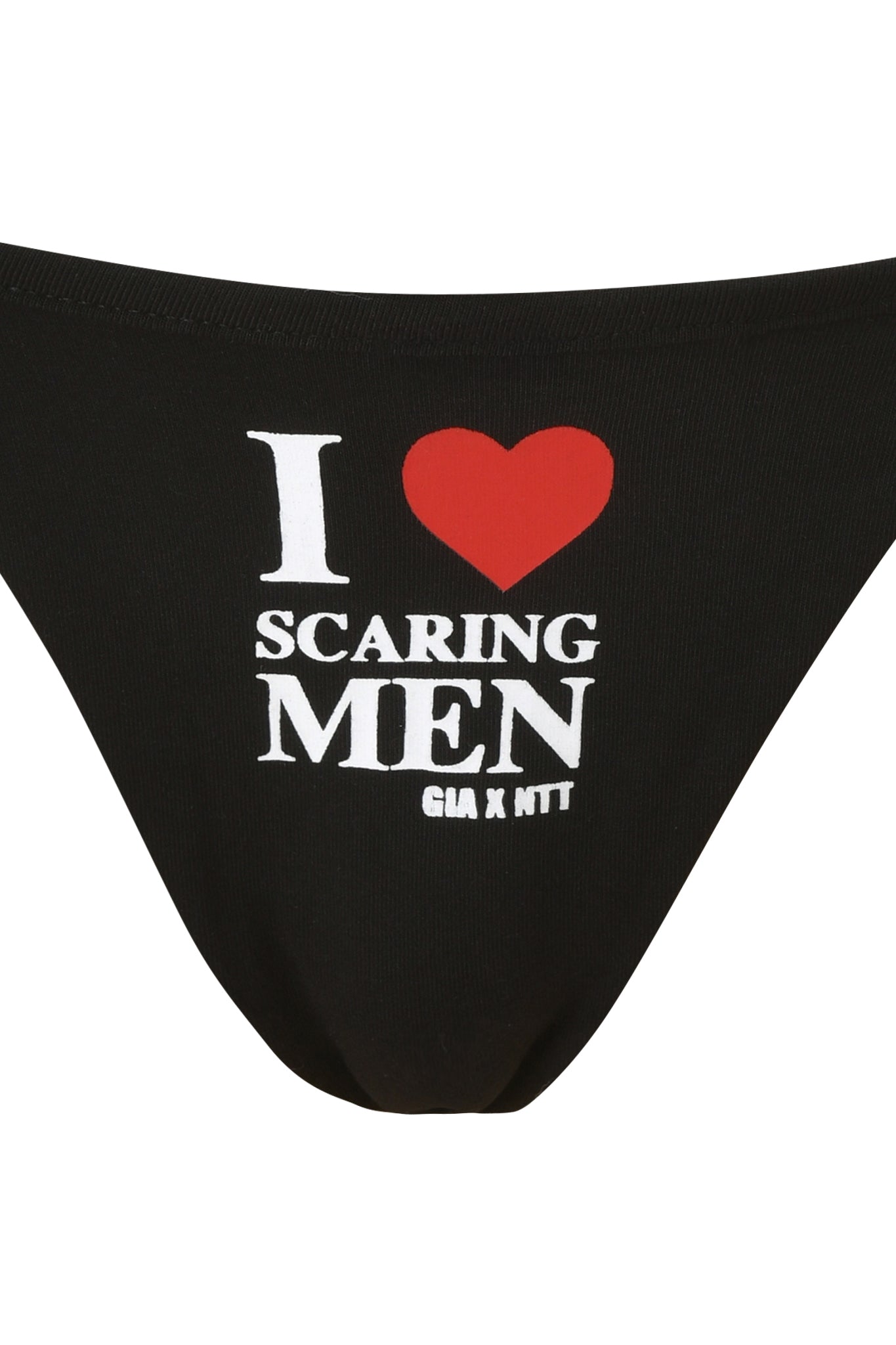 The POLINA G-STRING - SCARING MEN by I.AM.GIA is a black low-rise fit underwear featuring “I ♥ Scaring Men” in white with a red heart, plus “GIA X NTT” in smaller text underneath.