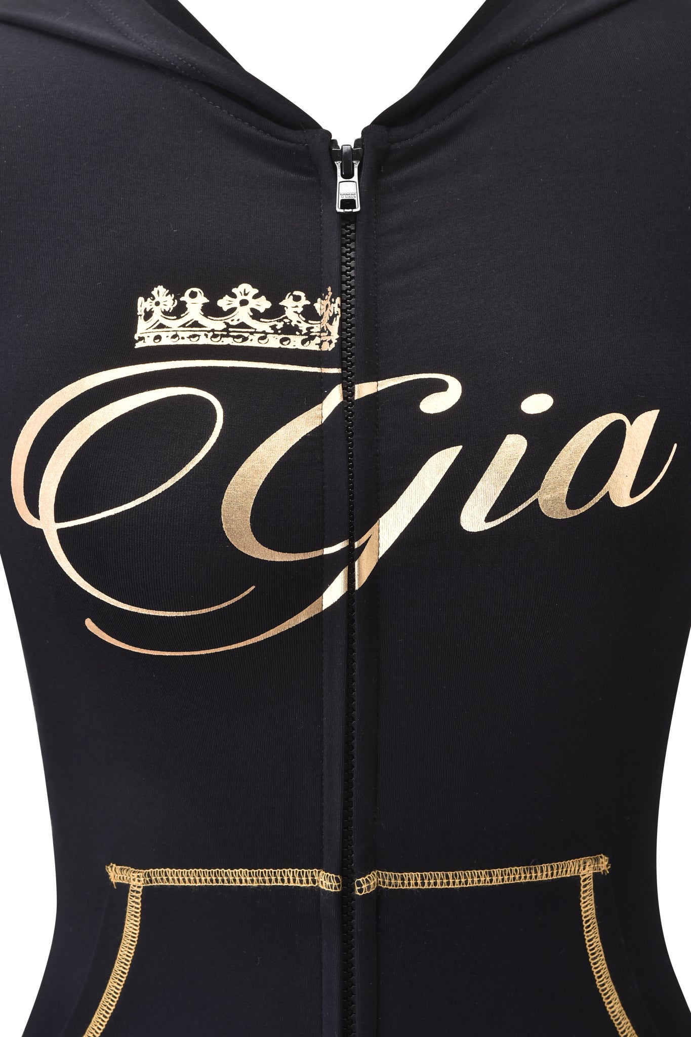 Close-up of the I.AM.GIA BLARE FORM MULTI POCKET HOODIE in black and gold, featuring gold pocket stitching, a body-hugging fit, and "Gia" in bold gold script with a crown graphic on the chest for a sleek, stylish look.