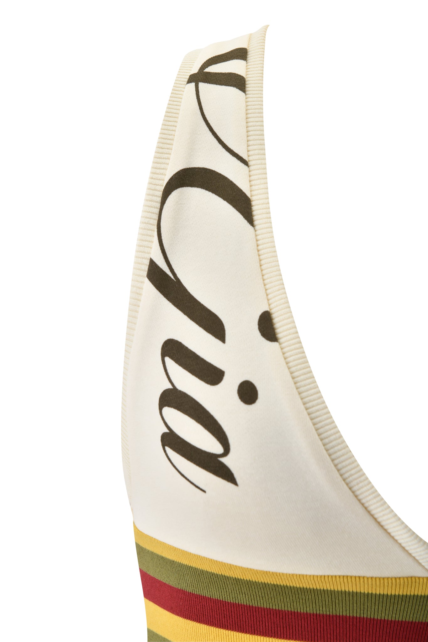 Close-up of the I.AM.GIA CANDI TOP - CREAM, a sleeveless V-neck racerback top with black script text and yellow, red, and green horizontal stripes near the hem.
