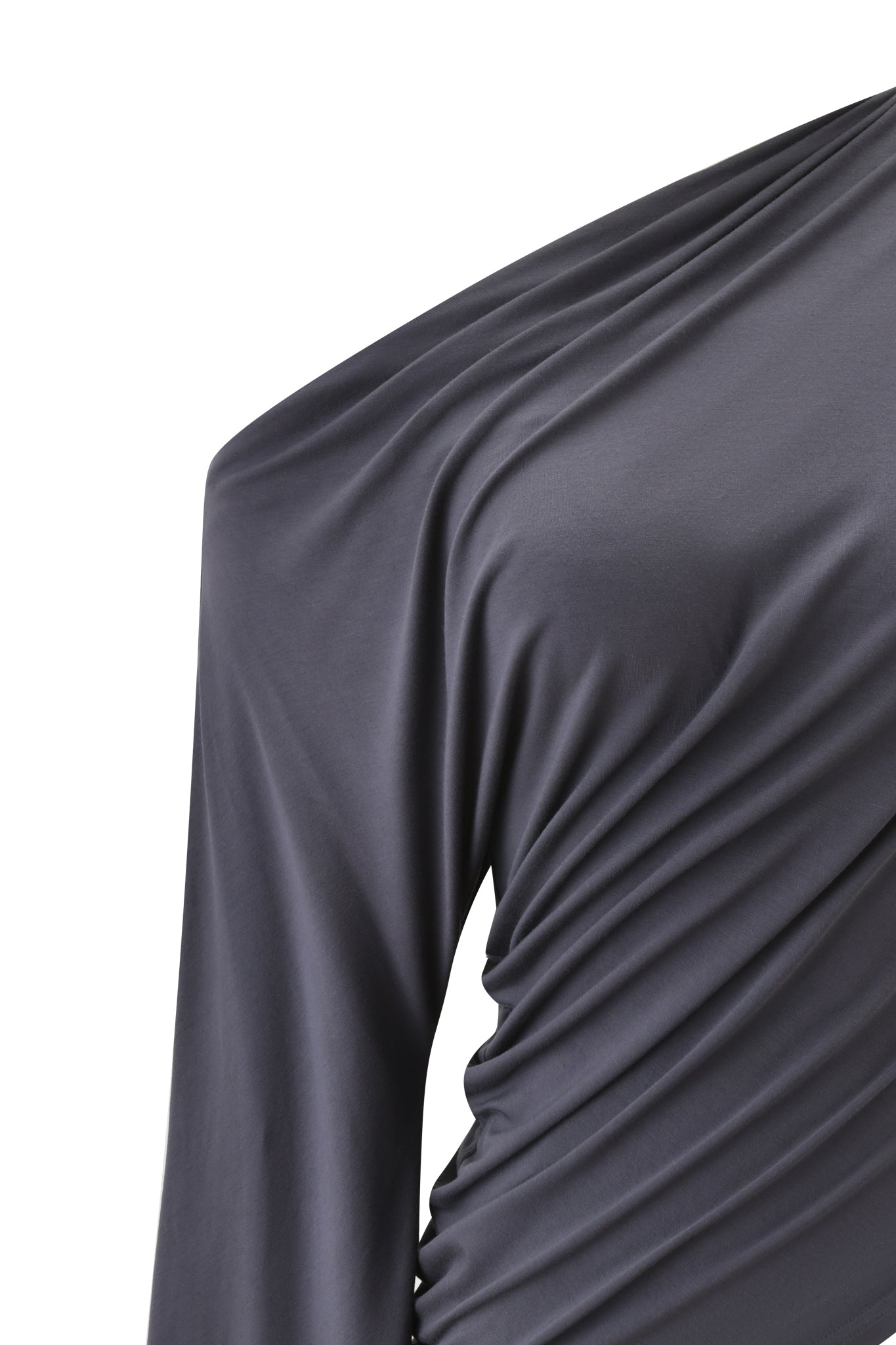 Close-up of the I.AM.GIA VIOLETTE ASYMMETRICAL TOP in grey, featuring a one-shoulder design, asymmetrical neckline, draped ruched fabric, and smooth, shiny texture with elegant diagonal folds.