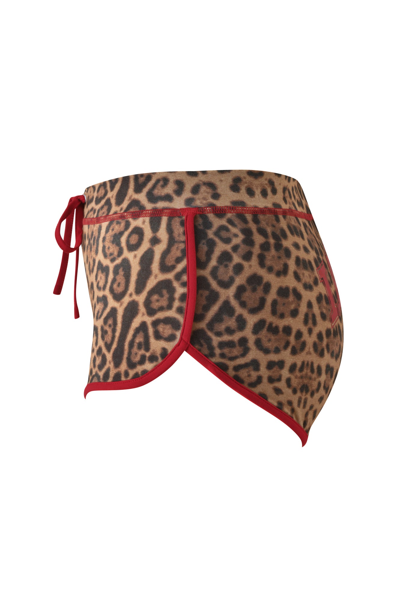 Side view of the I.AM.GIA BLARE DOLPHIN SHORT in Panthera print, featuring bold red trim and a tie closure on the left side, displayed against a plain white background—perfect for pairing with your favorite summer beach outfits.