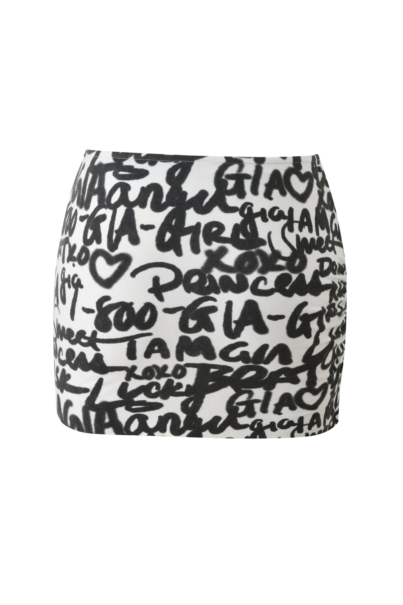 The HONEY MACRAME MINI SKIRT - WRITING ON THE WALL by I.AM.GIA is a white mini skirt featuring bold black graffiti-style text, hearts, and abstract doodles for an edgy statement look.