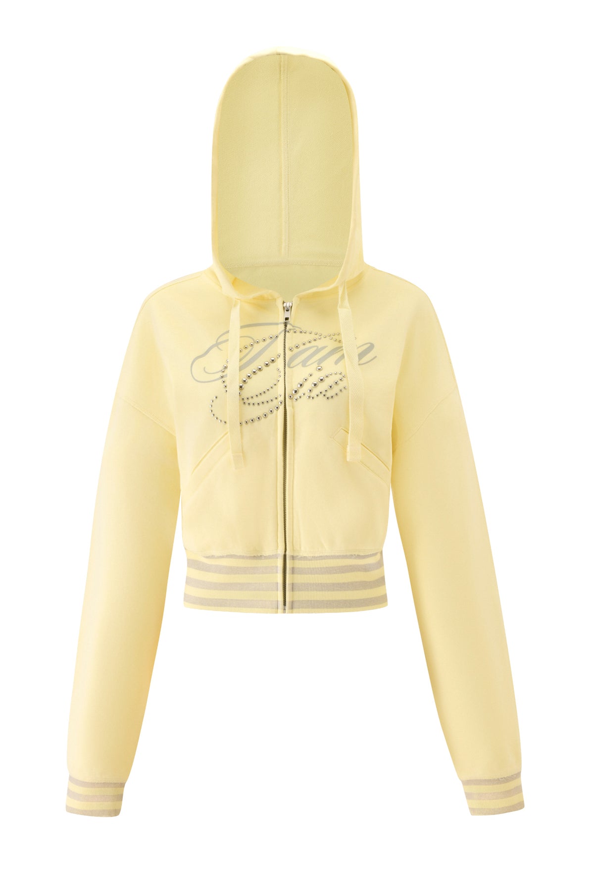 Pair your favorite I.AM.GIA VEDA PANT in yellow with this light yellow, cropped hoodie featuring a front zipper, gray stripes on the cuffs and hem, and cursive silver writing across the chest. The hoodie is designed with drawstrings at the hood and long, slightly loose sleeves—ideal for wearing with wide-leg styles or your go-to I.AM.GIA track pants.