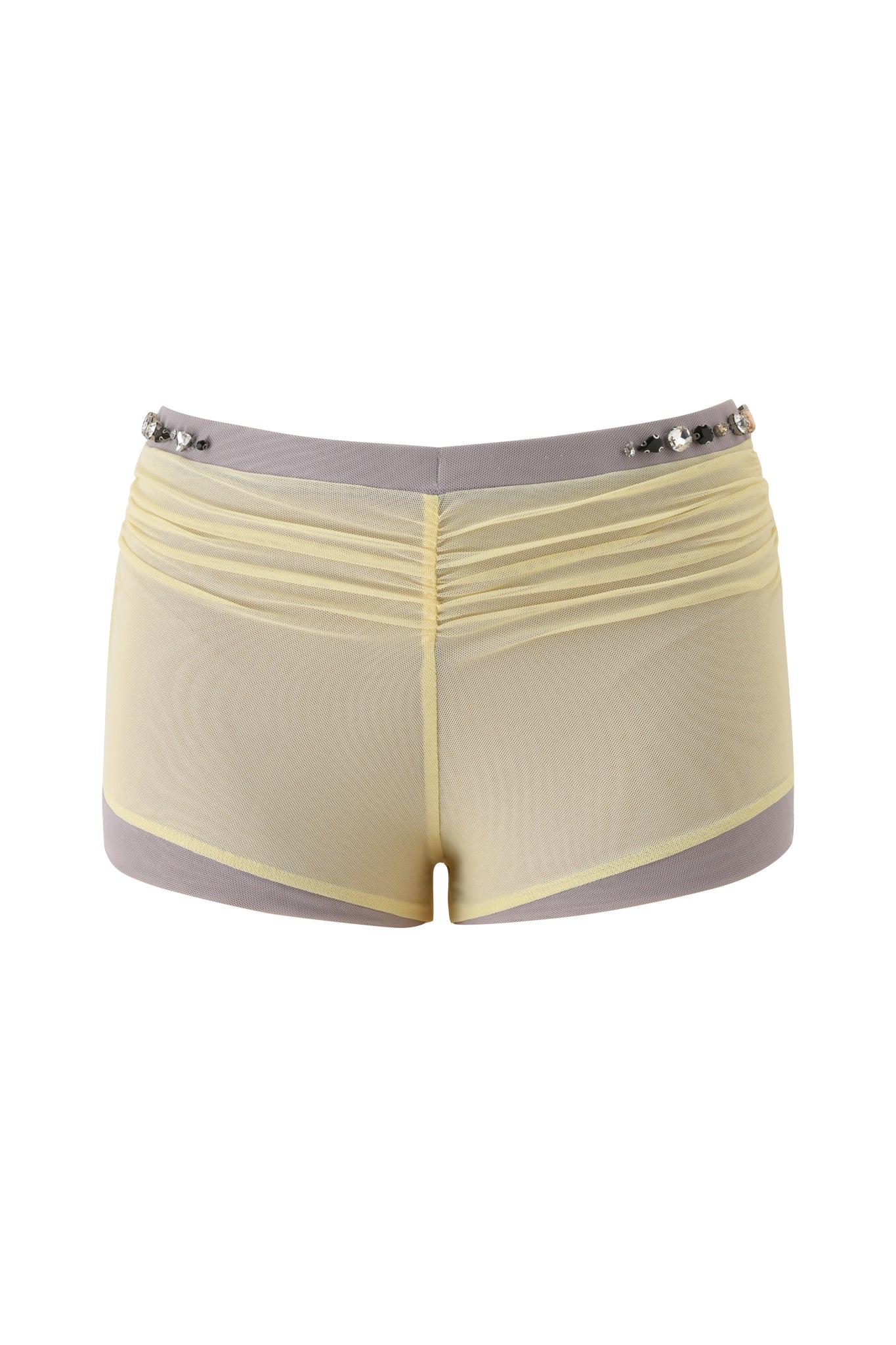 The I.AM.GIA AMATHA SHORT in butter yellow features a mesh front, gray waistband and leg hems, back ruching, decorative studs on the waistband, and a flattering bodycon fit.