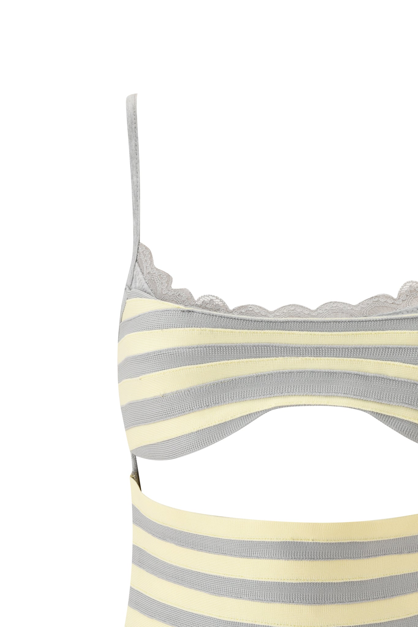 A close-up of the I.AM.GIA NYNA BANDAGE CAMI TOP in yellow, featuring thin straps, a bodycon fit, scalloped lace trim, and alternating light yellow and gray horizontal stripes.