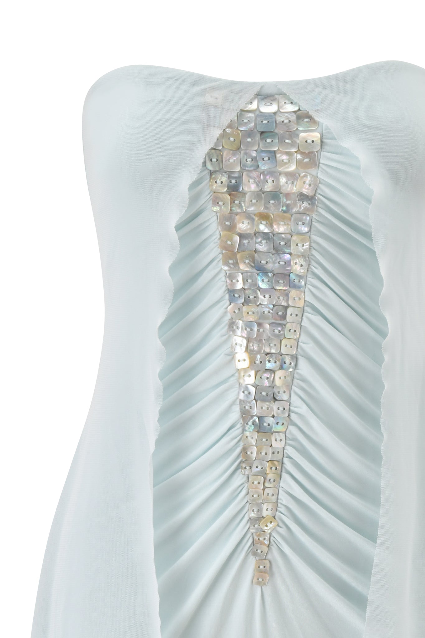 A close-up of the I.AM.GIA ARIEL MINI DRESS in baby blue showcases its ruched design and a central panel with iridescent square buttons arranged vertically.