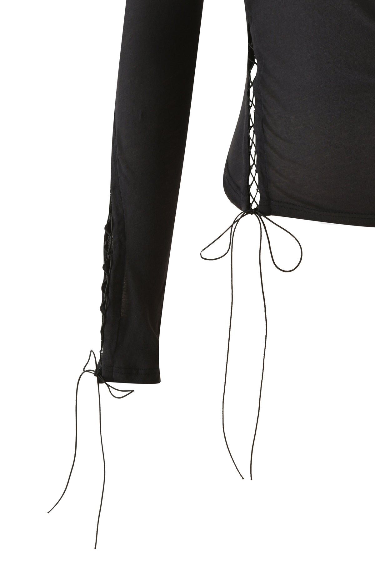 Close-up of the I.AM.GIA PRIS TOP in black—an asymmetrical long-sleeve top showcasing lace-up details and tied bows along the side and sleeve, artfully revealing some skin through the lacing.