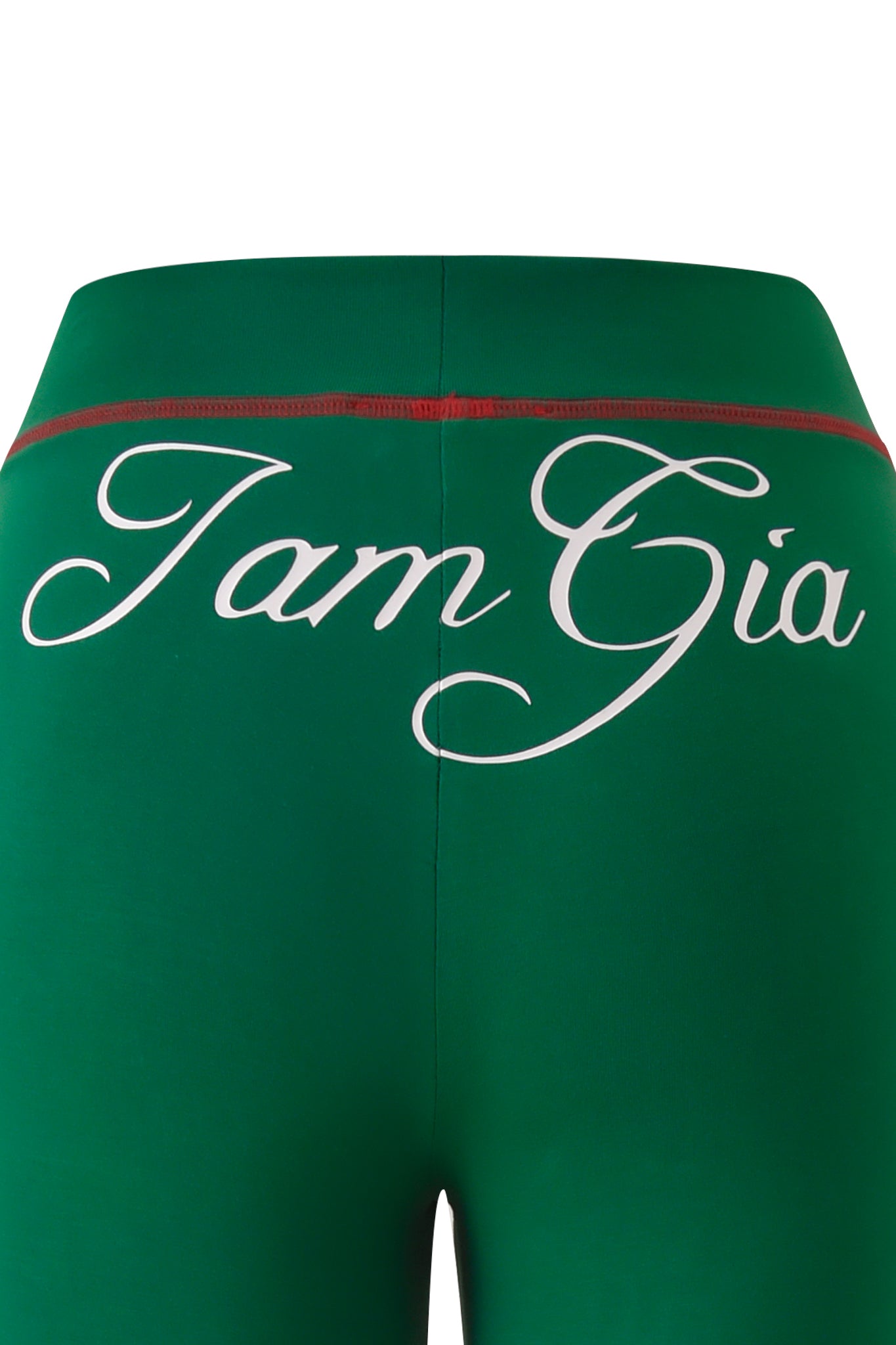 The BLARE SPORT TRACKPANT - GREEN by I.AM.GIA features a red-seamed waistband and "I am Gia" in bold white cursive on the back. Crafted from buttery-soft fabric for comfort and a sporty style.