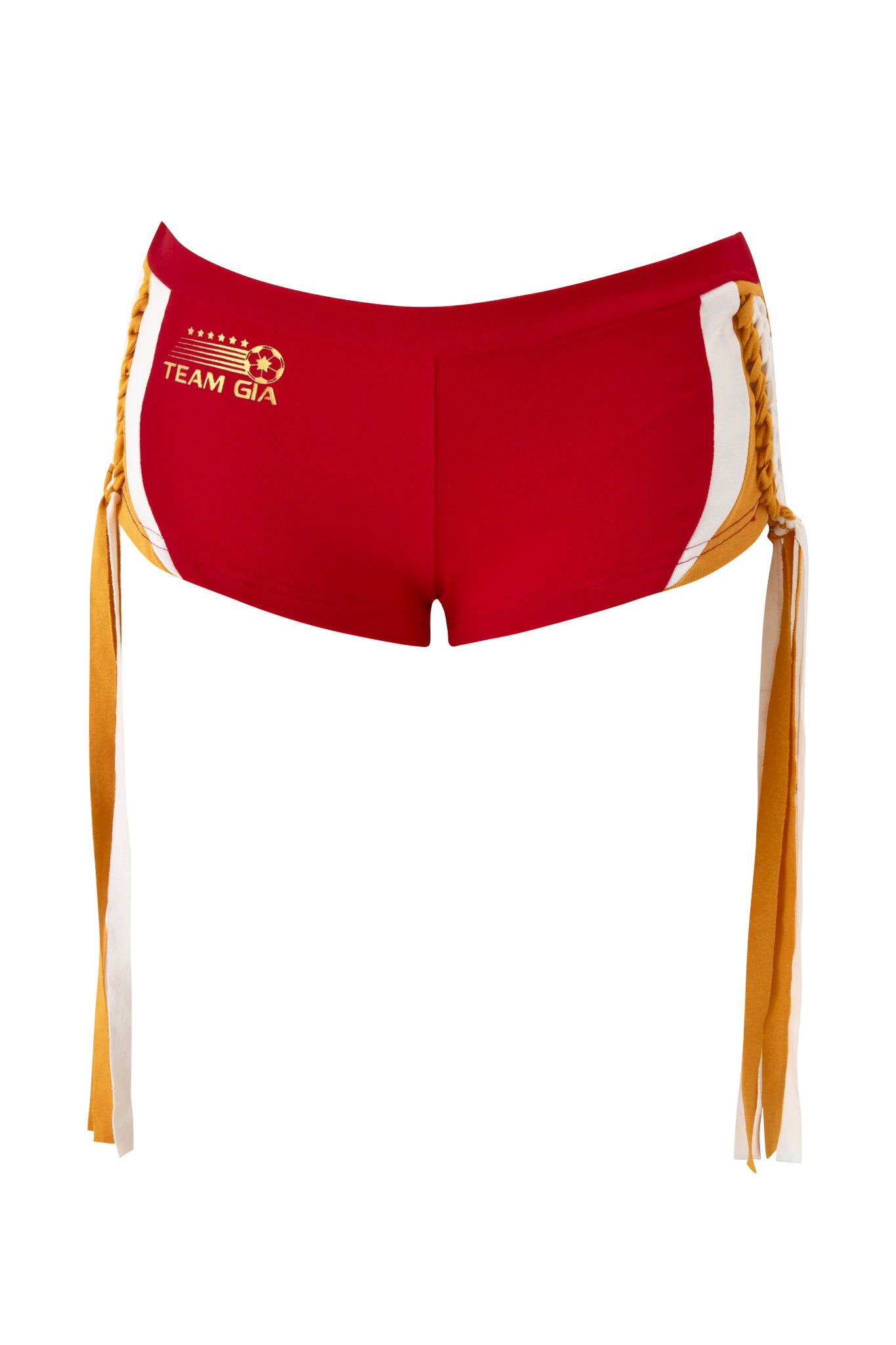 The NOVIA MICRO SPORT SHORT by I.AM.GIA features red stretch cotton, white side panels, gold side laces, and “TEAM GIA” with a gold star and swoosh logo on the left front. Displayed on a white background.