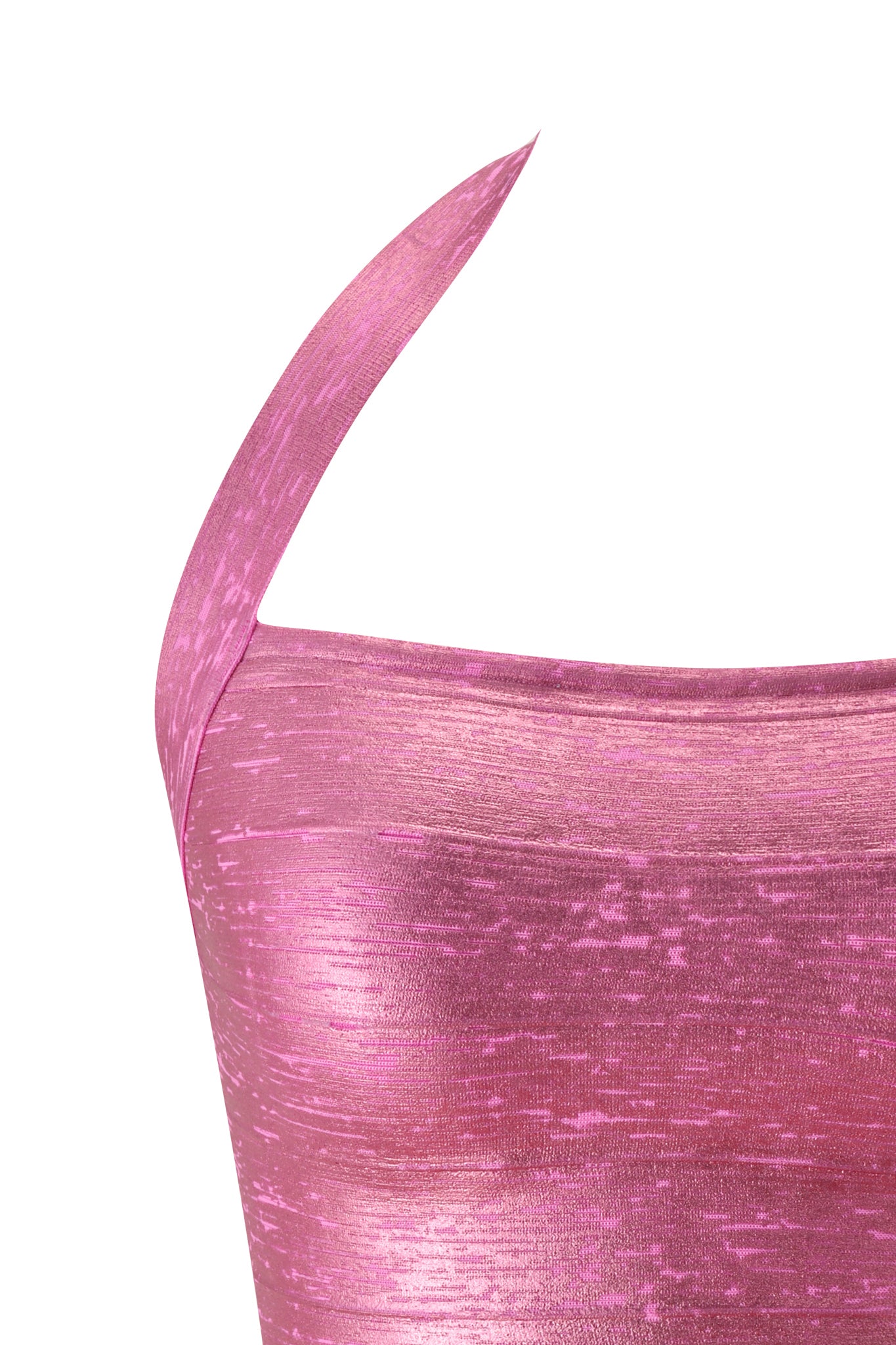 A detailed close-up of the AIDEN PLATINUM BANDAGE TOP in fuchsia by I.AM.GIA, showcasing its shiny, pink textured fabric and bandage-style bodycon fit with one visible spaghetti strap against a white background.