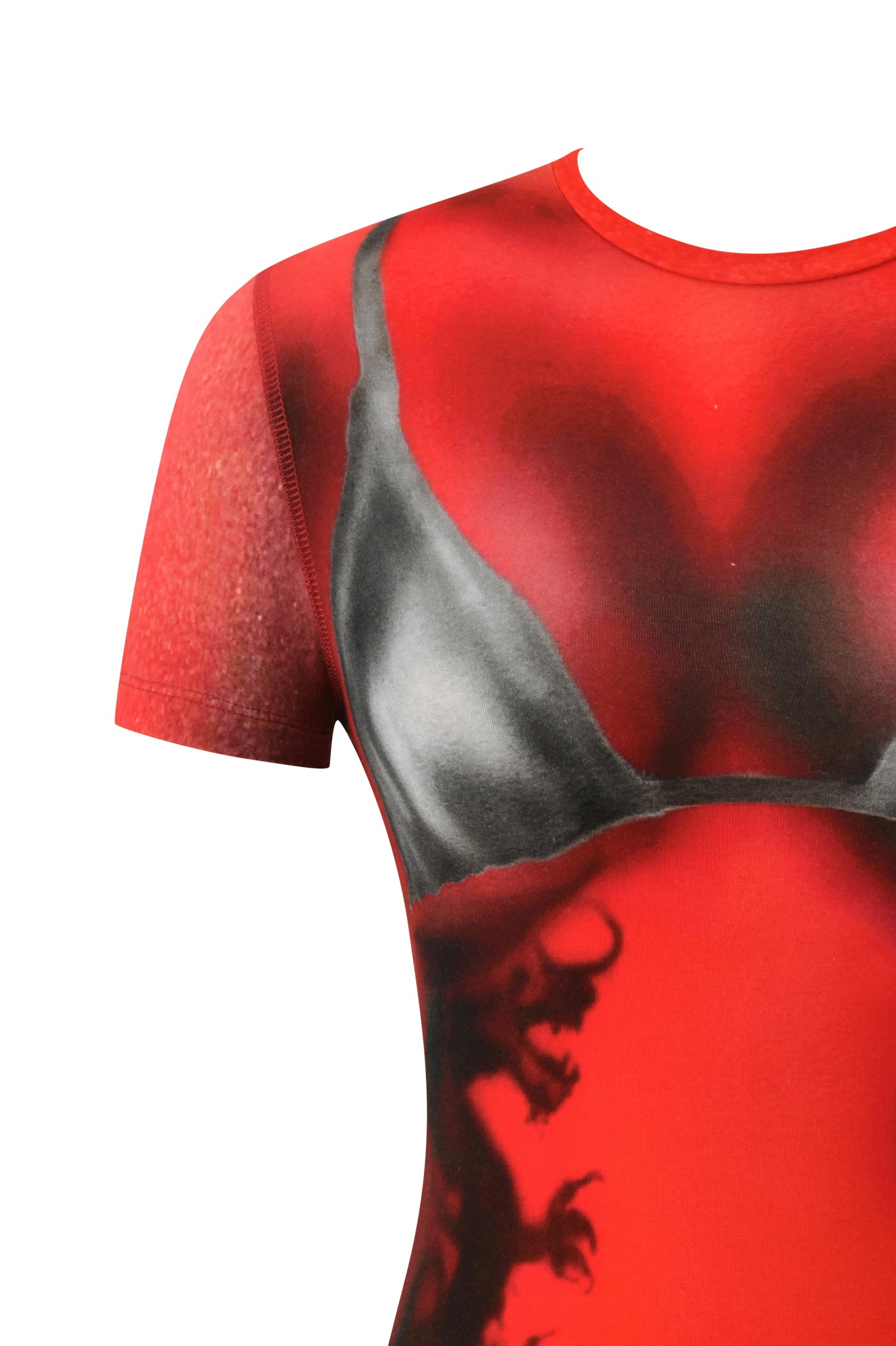 A close-up of the I.AM.GIA T-REX SPRAY BIKINI BLARE TEE in red, showcasing a black and gray airbrushed bikini-print design with shadowy figures near the hem, set against a plain white background.