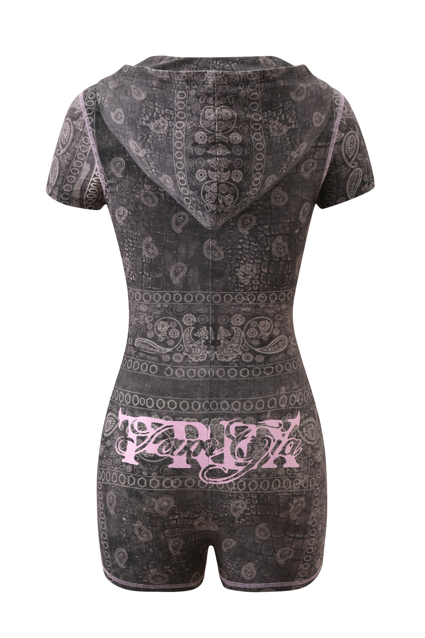 The T-REX BLARE SHORT SLEEVE ROMPER - CHARCOAL BANDANA by I.AM.GIA is a charcoal grey, short-sleeve hooded romper featuring intricate bandana print patterns and bold pink “TRAP” lettering across the lower back—shown from the back, perfect for a festival look.