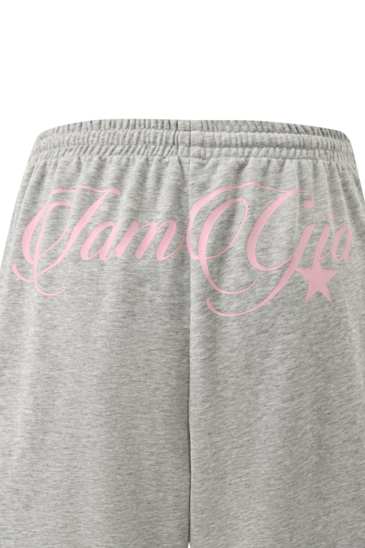 Introducing the BEX TERRY SHORT - GREY by I.AM.GIA. These grey marle jersey shorts feature pink “IamGia” script and a star graphic on the back, just below the elastic waistband. Designed in a relaxed fit, they combine comfort and style for an effortlessly casual look.