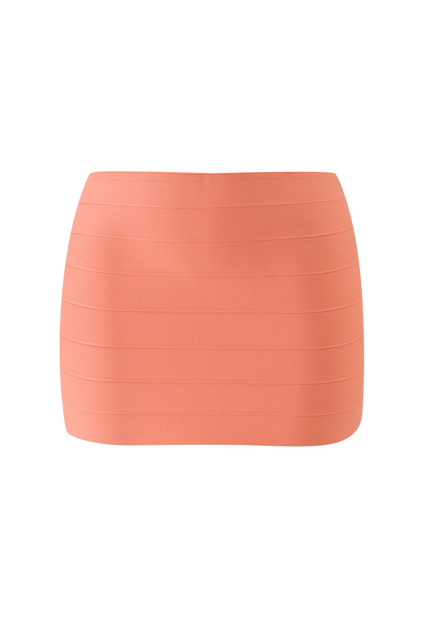 The AIDEN BANDAGE MINI SKIRT in neon peach by I.AM.GIA is a flattering, fitted mini skirt crafted in a bandage bodycon style, with subtle horizontal seam detailing and shown on a plain white background.