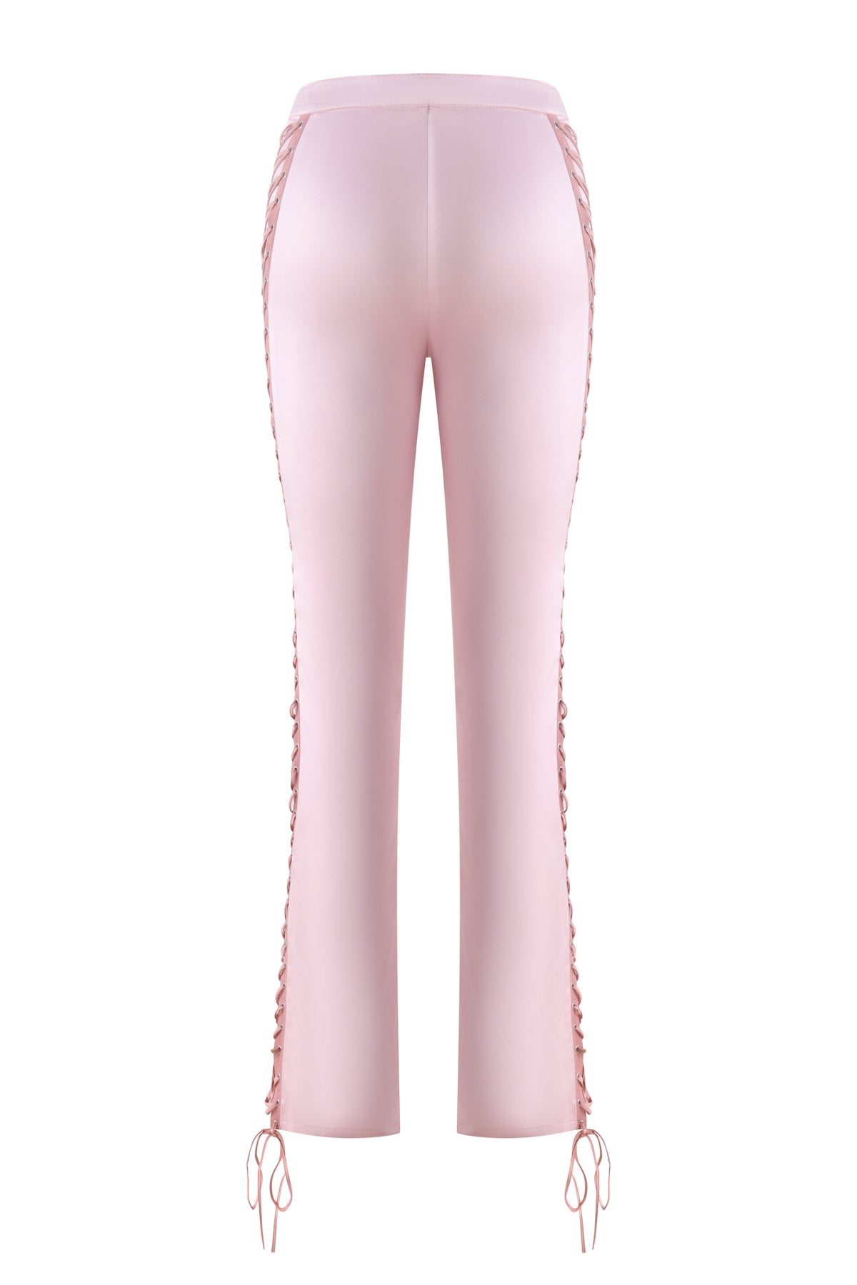 The HOLLI SATIN PANT 2.0 - PINK by I.AM.GIA is crafted in a light pink satin fabric and features a straight leg silhouette, with lace-up detailing along the side seams and adjustable ties at the ankles for a feminine finish.