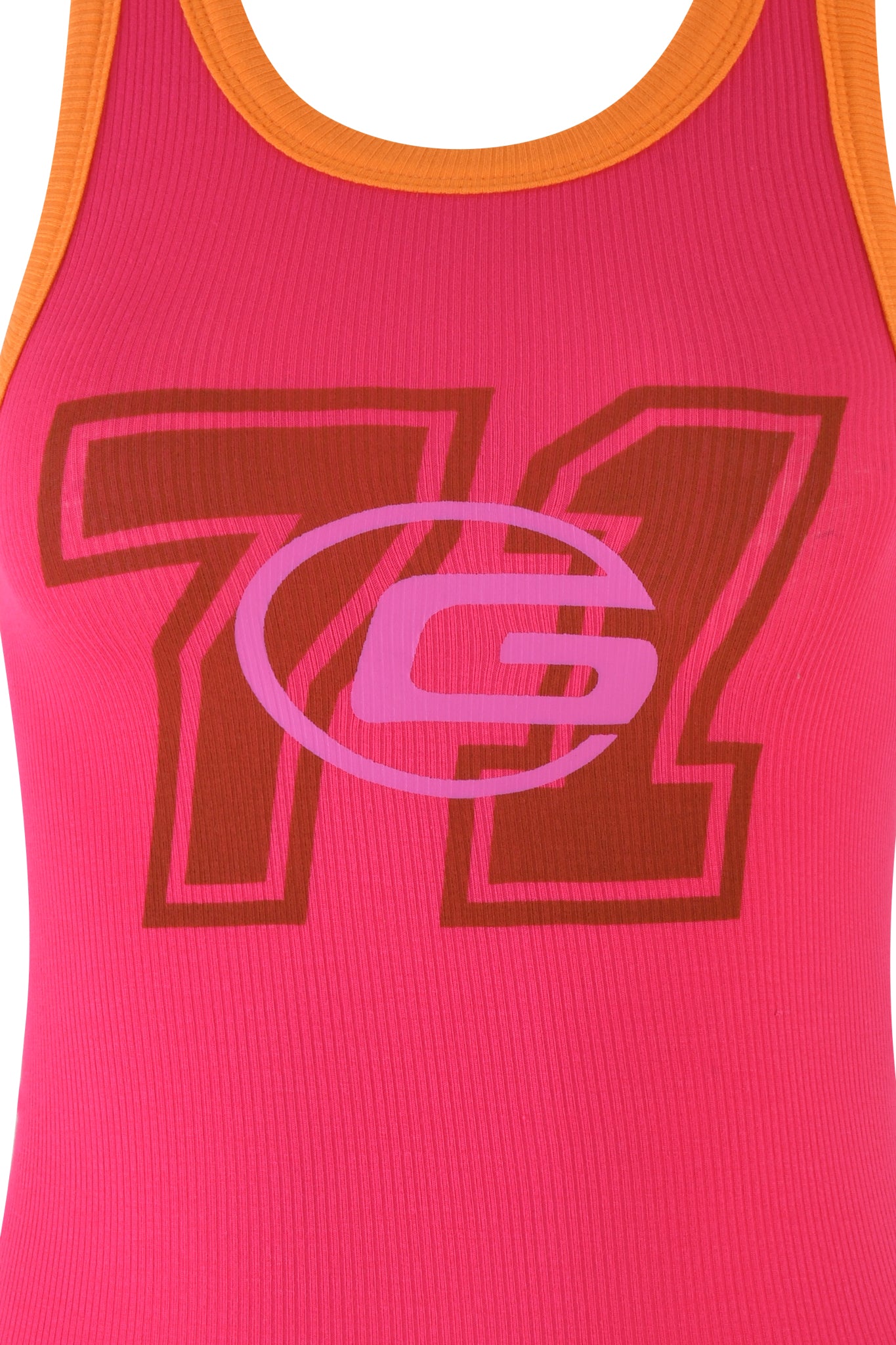 Close-up of the PENELOPE TANK by I.AM.GIA, a hot pink sleeveless racer top featuring an orange trim. The design includes a distinctive graphic: a large dark brown number "71" with a stylized white letter "G" layered over it. The fabric showcases a ribbed texture.