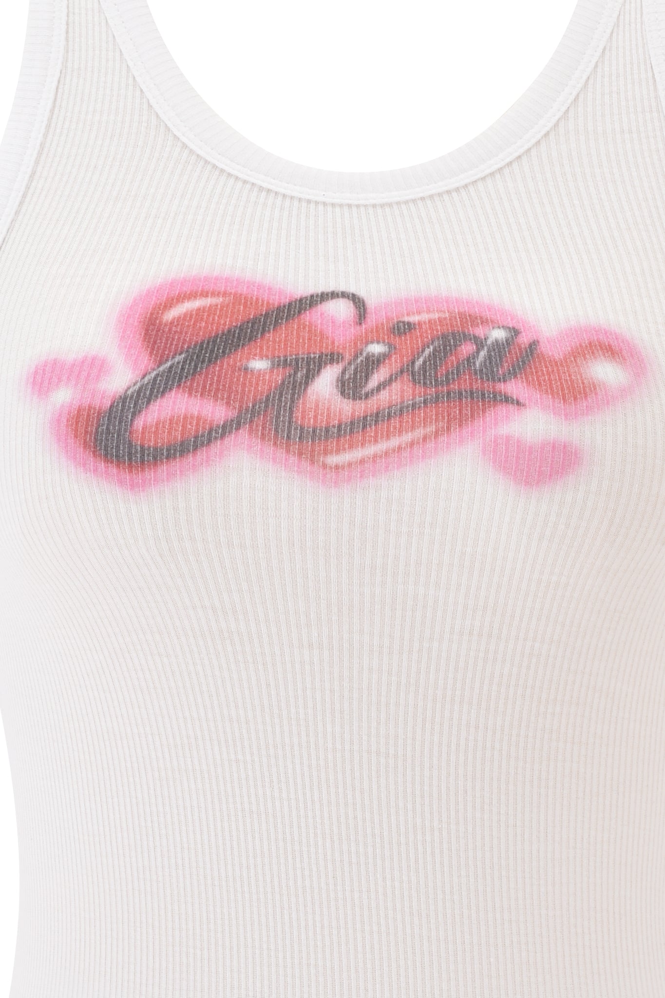 A close-up of the PENELOPE TANK - PINK AIRBRUSH by I.AM.GIA, a white ribbed tank top with black and pink graffiti-style "Gia" logo print across the chest.