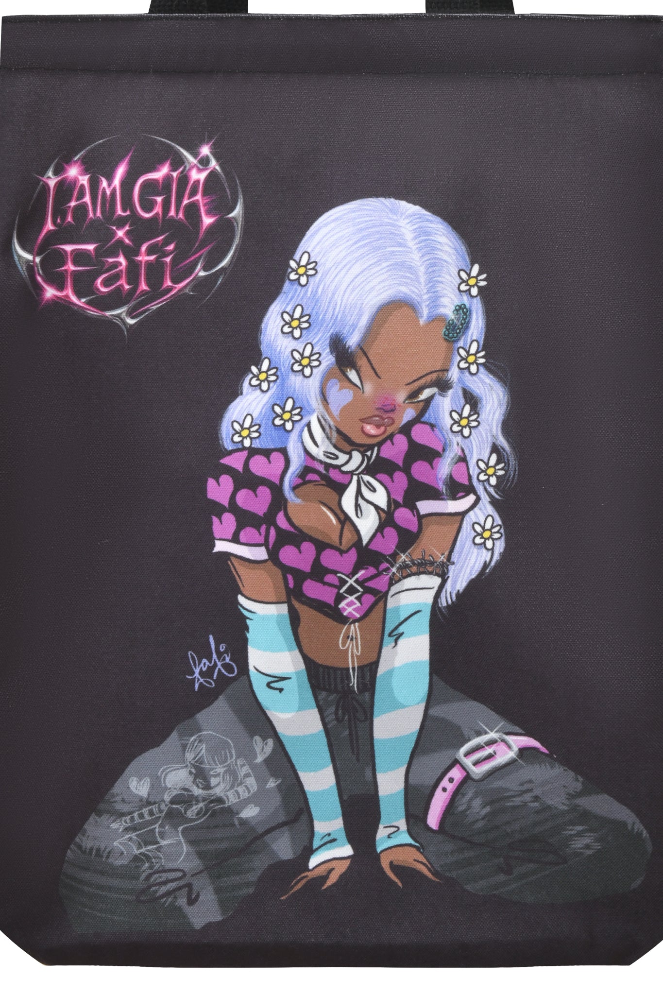 The FAFI TOTE BAG - BLACK by I.AM.GIA features an exclusive Fafi print with a silver-haired girl, blue stripes, pink heart crop top, black pants, daisies in her hair, and "I AM GIA FAFI" text—a standout from the FAFI collab.