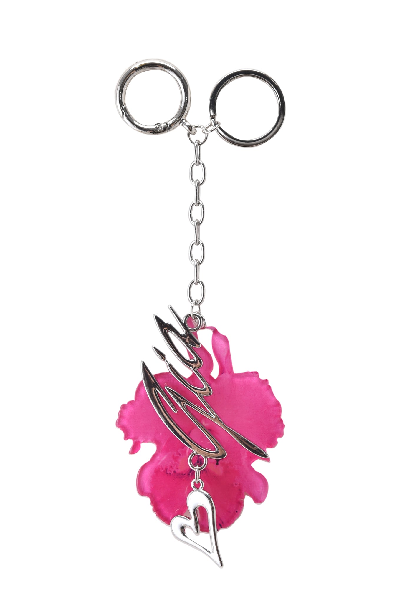 The ORCHID KEYCHAIN - NEON PINK by I.AM.GIA features a silver chain with a vibrant pink orchid flower charm, a metallic GIA logo accent, and a small silver heart pendant.