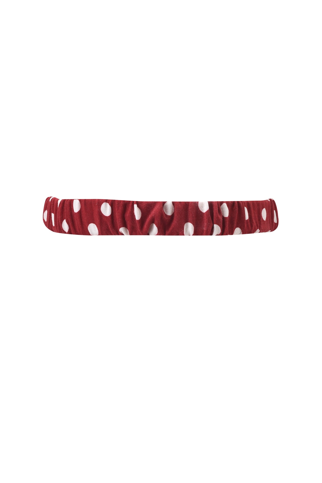 A red elastic headband with white polka dots by I.AM.GIA, shown on a white background—ideal for pairing with the MELANIE SLEEPWEAR - RED POLKA DOT set or matching robe and eye mask.
