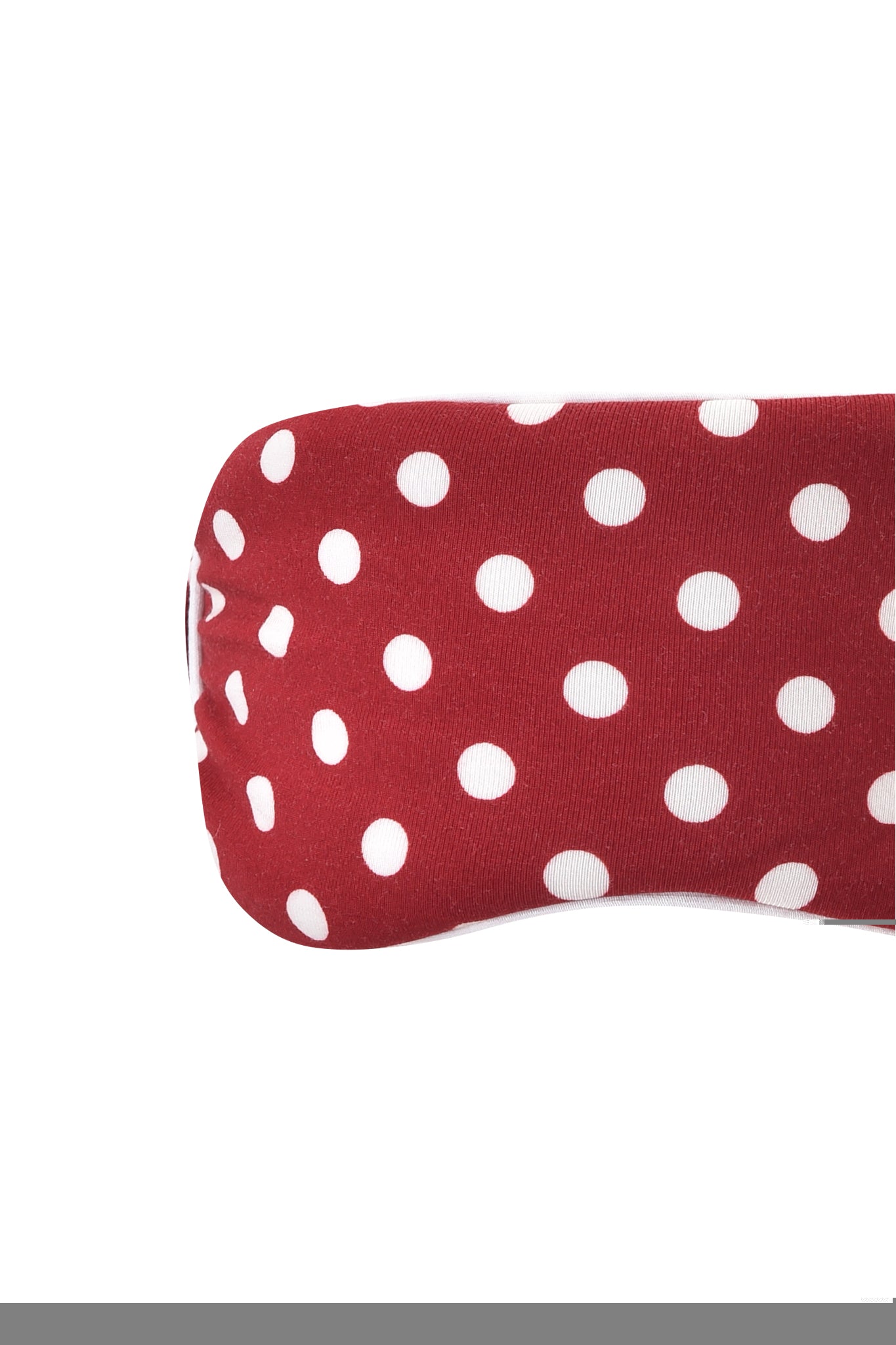 A close-up of the MELANIE SLEEPWEAR - RED POLKA DOT by I.AM.GIA, featuring red fabric with white polka dots, shown against a plain white background.
