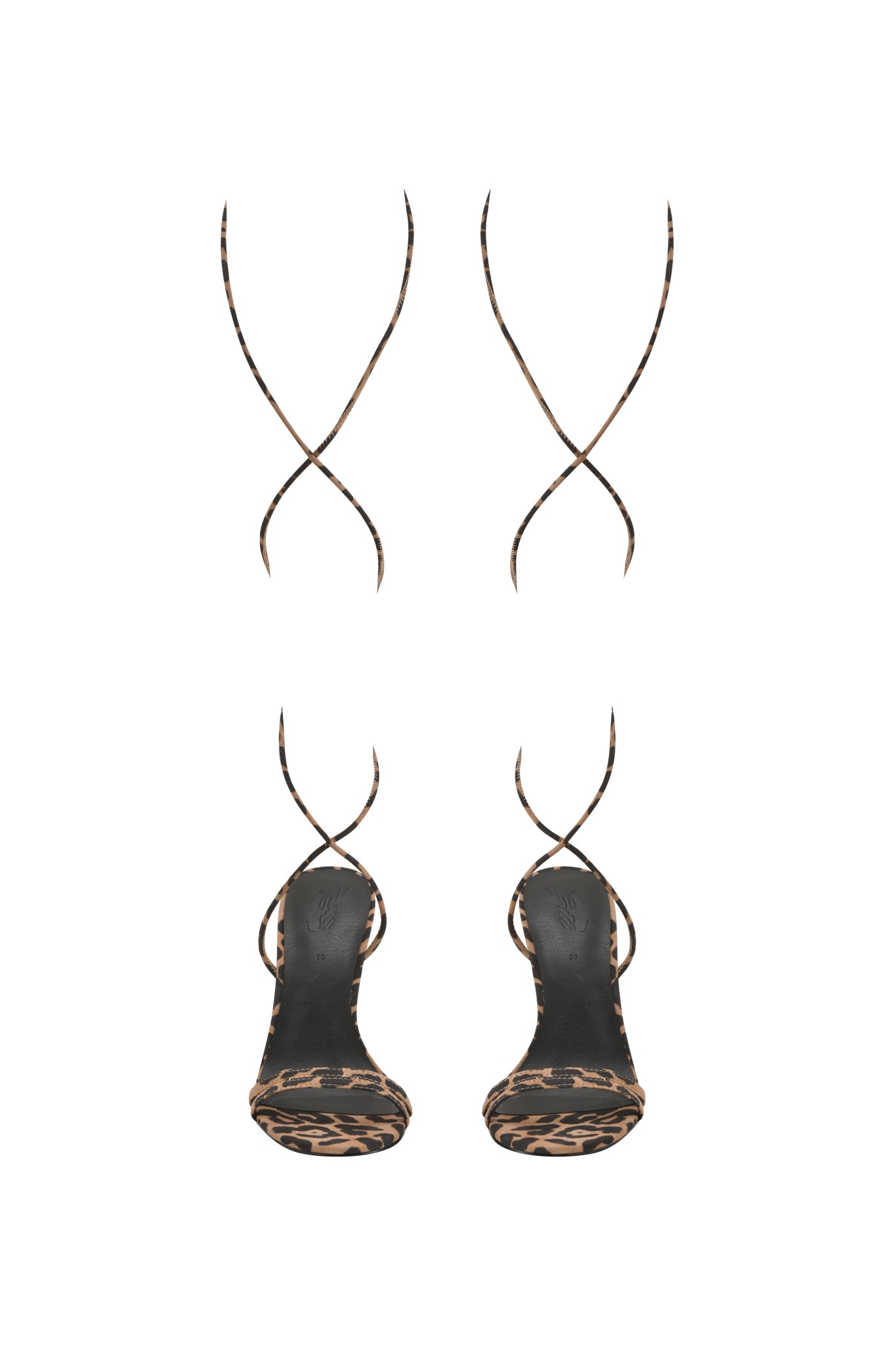 The SCARLETTE HEEL - LEOPARD by I.AM.GIA features strappy stiletto sandals with thin crisscross ankle straps and a bold leopard print heel, shown against a white background.