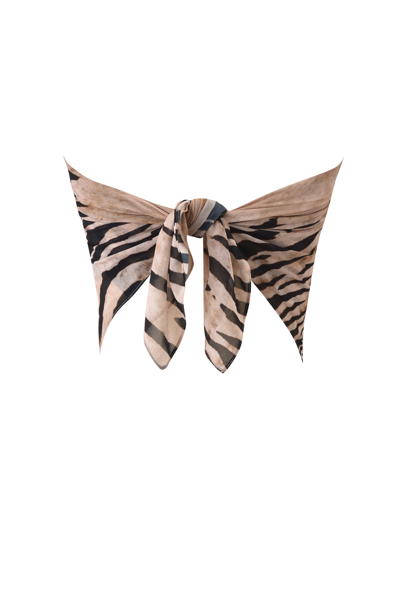 The ALLUNA MULTI-WEAR TASSEL SCARF - WILD SIDE by I.AM.GIA features a beige and black zebra animal print, styled in a loose knot against a white background.