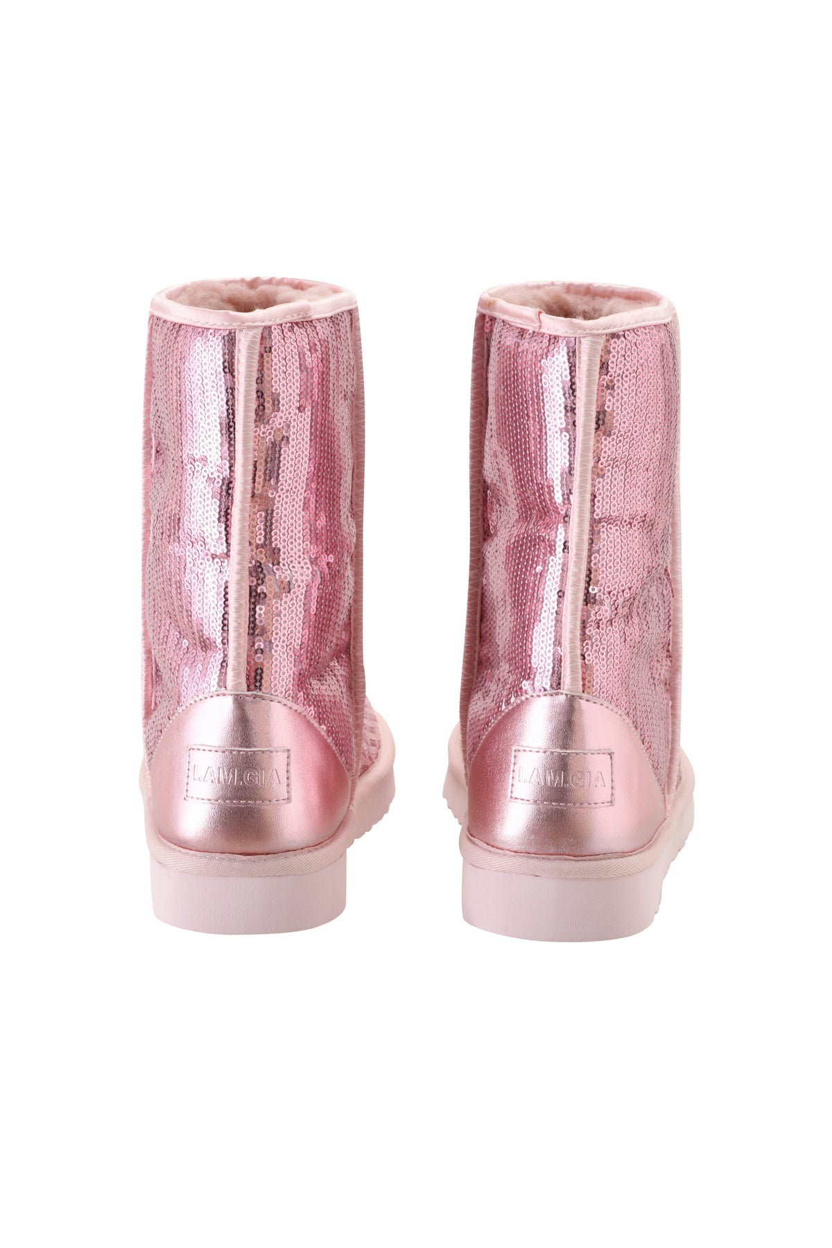 The ELVIRA SEQUIN BOOT - PINK by I.AM.GIA is a pair of mid calf boots, showcased from the back, featuring pink sequins and light pink soles. The insides are lined with soft beige material, ensuring both eye-catching sparkle and comfortable wear.