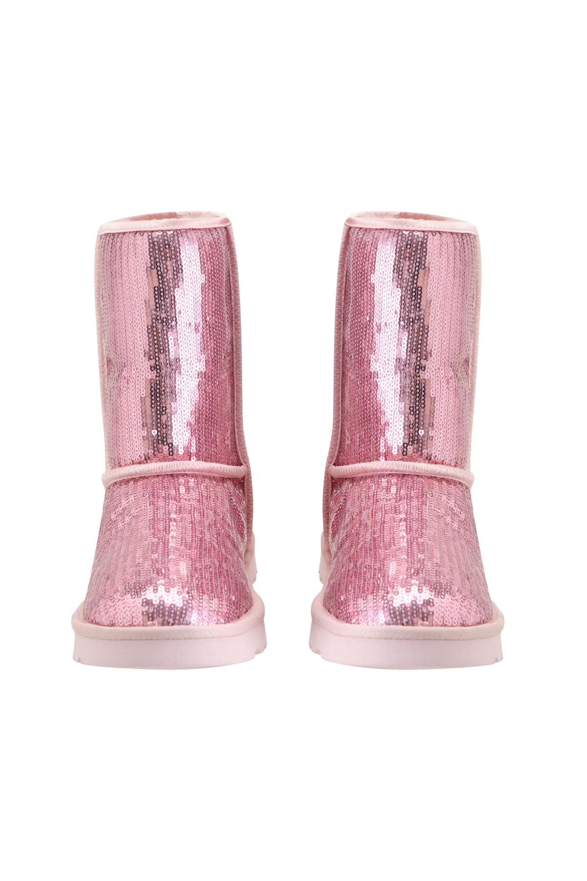 A pair of ELVIRA SEQUIN BOOT - PINK by I.AM.GIA, featuring shiny pink sequins and flat soles, shown from the front against a white background.