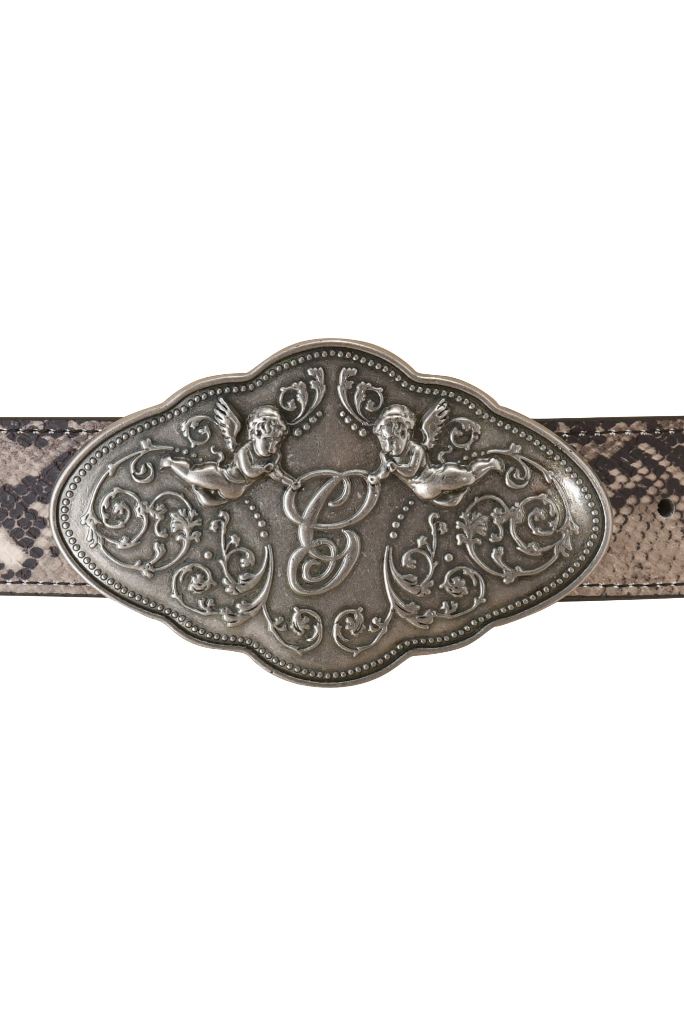 The MEDUSA BELT - TAN SNAKE by I.AM.GIA features a silver western-style buckle adorned with ornate scrollwork, two cherubs, and a bold central “B”, paired with an adjustable faux leather belt in a python print.