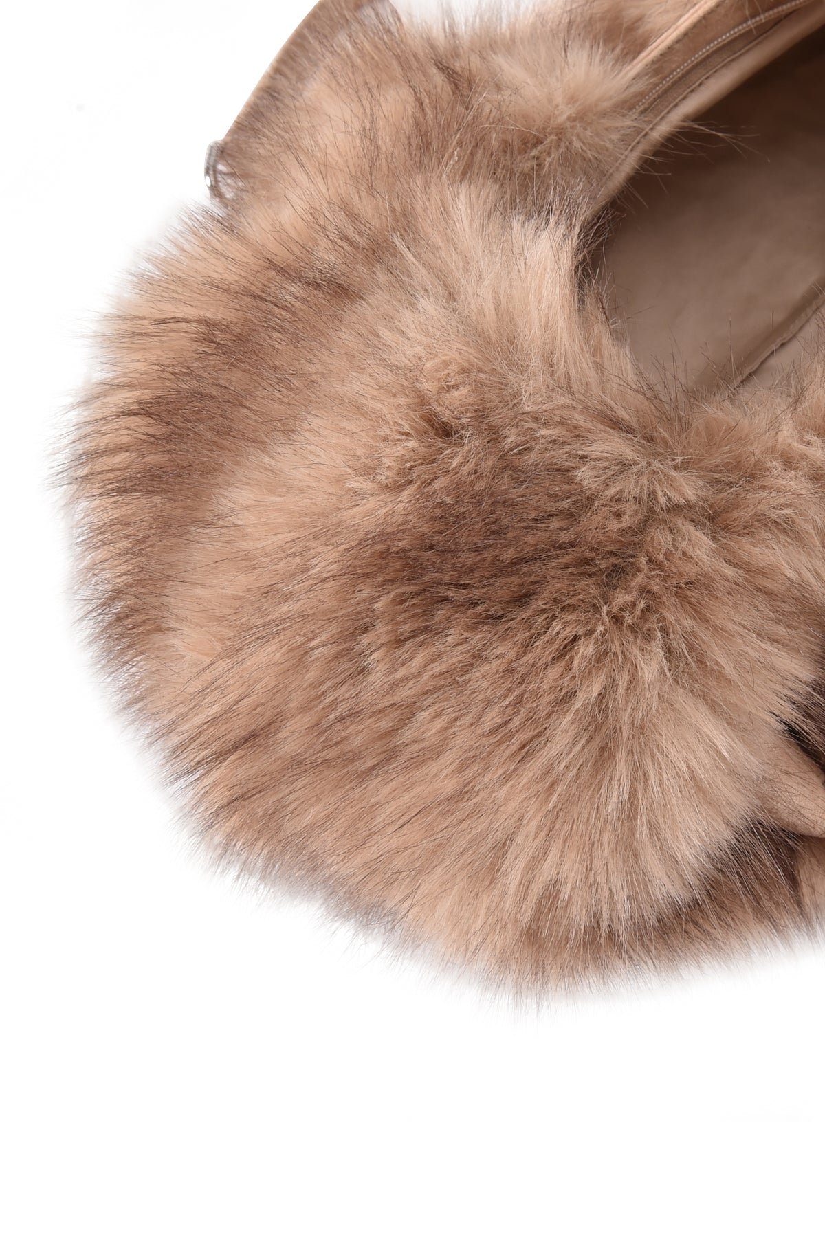 Close-up of the soft, fluffy, light brown faux fur trim on the GENA FAUX FUR HANDBAG - TAN SUEDE by I.AM.GIA, set against a white background.