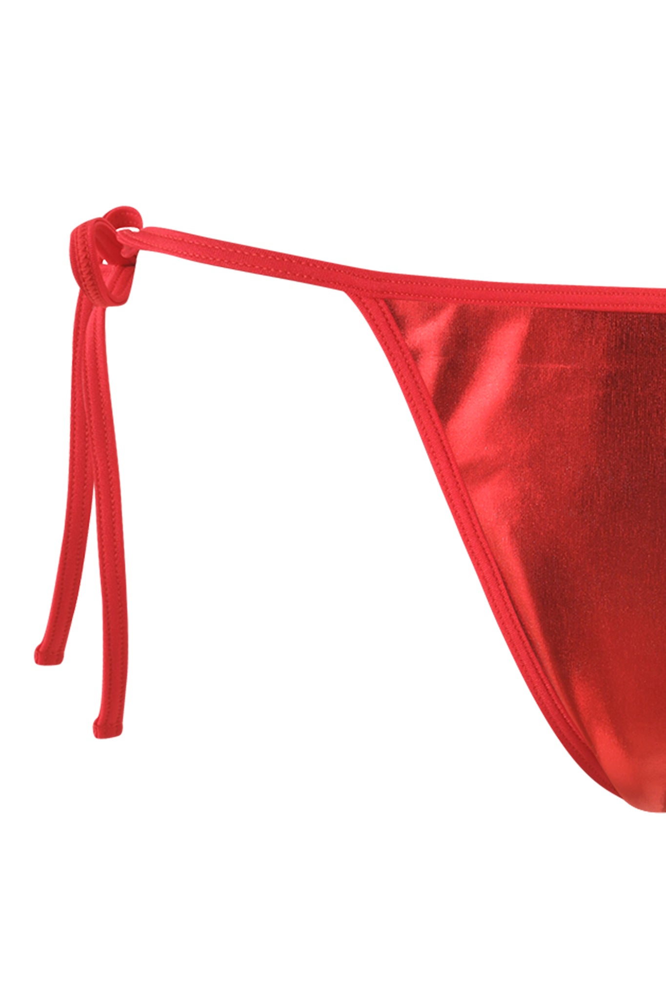 Close-up view of the side detail of the shiny red ALOHI BIKINI BOTTOM by I.AM.GIA, featuring a string tie on the side. The fabric boasts a glossy, metallic finish.