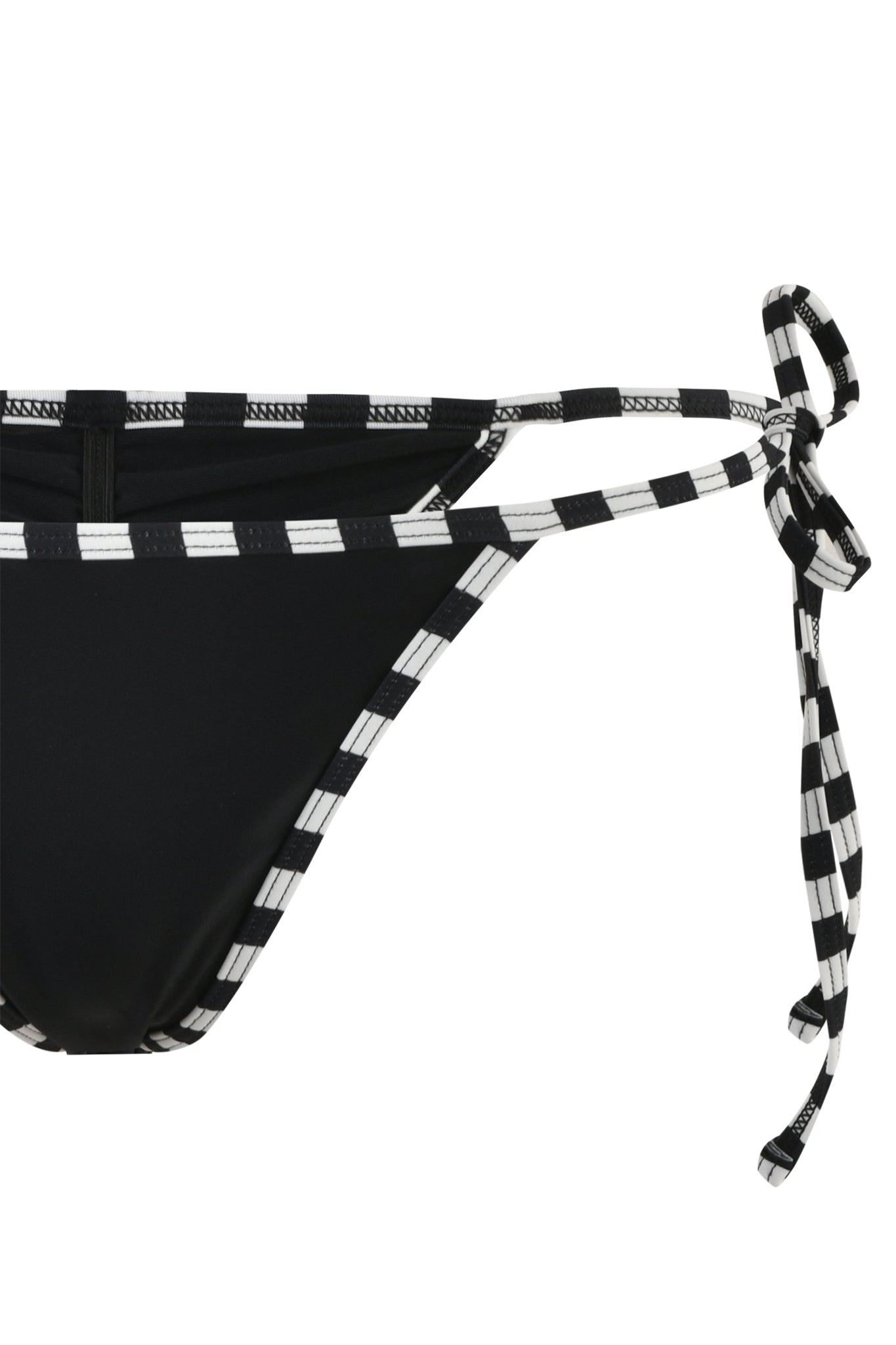 Close-up of the RHIANNE BIKINI BOTTOM - BLACK, featuring black and white checkered side strings tied in bows, embodies the bold style of I.AM.GIA. The pattern of the strings contrasts beautifully with the solid black fabric. The image captures the right half of this chic bikini bottom.