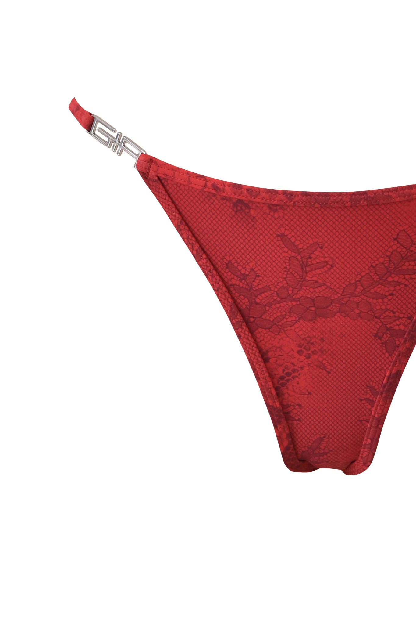 A close-up of the I.AM.GIA AVA BIKINI BOTTOM - RED SERPENTINE, showcasing lace details and a silver clasp on the left strap, set against a white background.