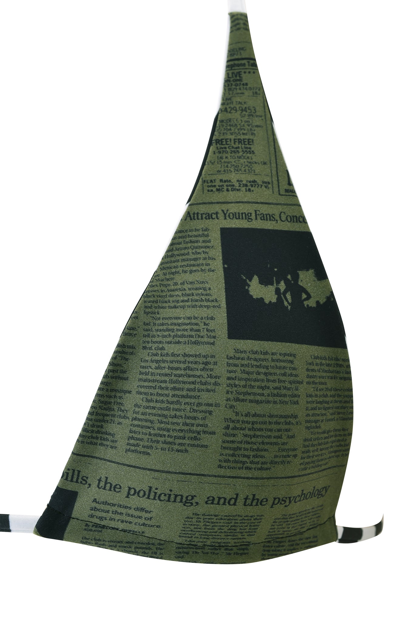 A close-up of the I.AM.GIA AURETTE REVERSIBLE BIKINI TOP - JAILBIRD STRIPE, featuring bold black and green stripes that echo the striking visual style of newspaper print with a modern twist.