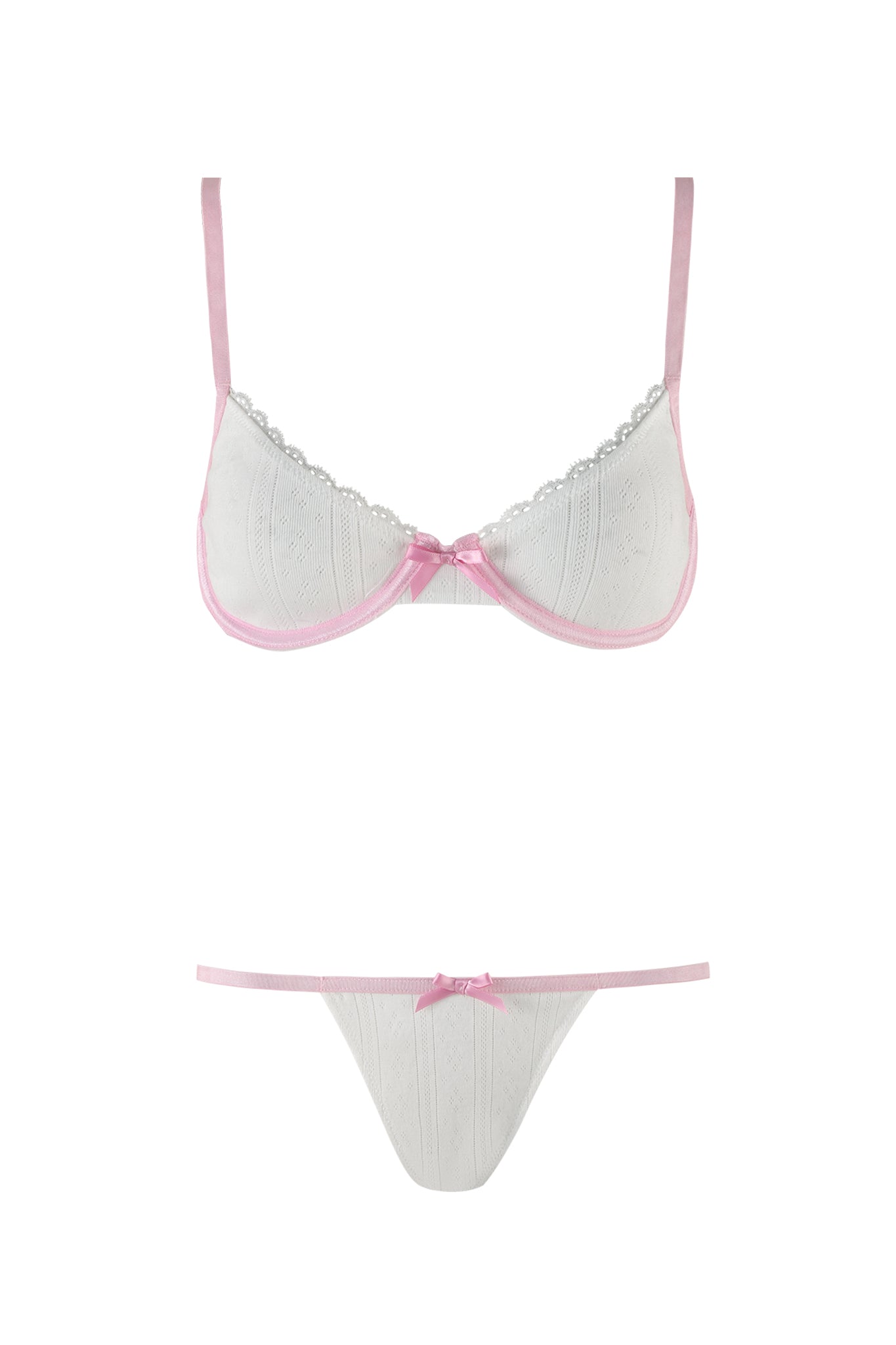The SKYE SET - WHITE by I.AM.GIA is a pointelle lingerie set that includes a bra and g-string. The white bra features pink trim, thin pink straps, lace edging along the top, and is adorned with a delicate pink bow in the center. The matching g-string has pink trim and a small pink bow at the front.