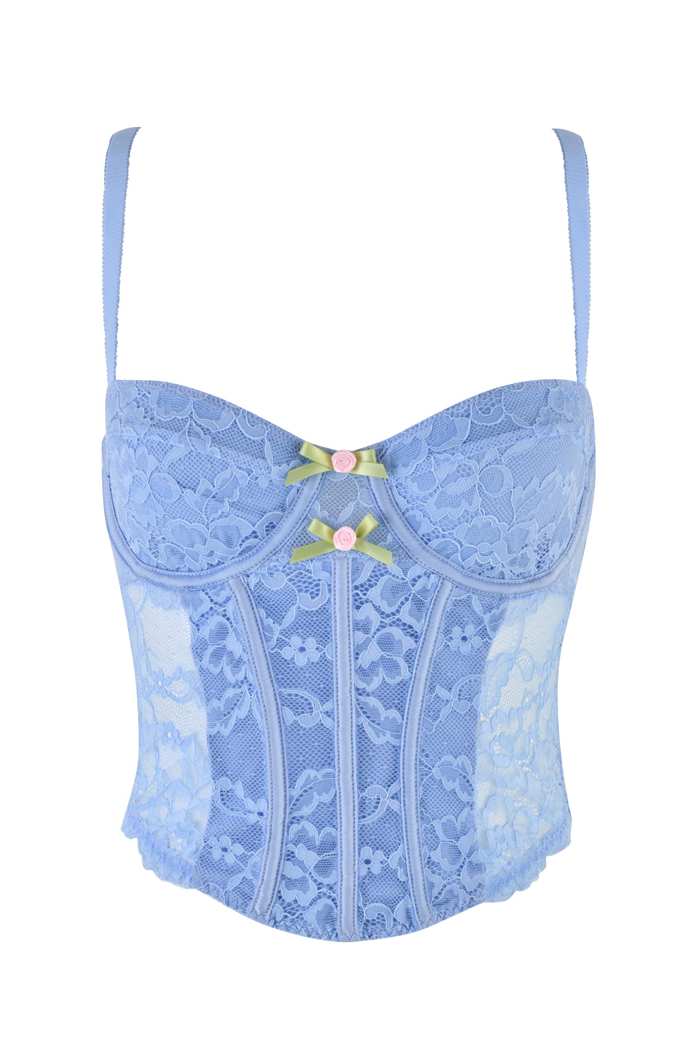 The CALLISTA BUSTIER - BLUE : LACE from I.AM.GIA features a light blue lace design with floral patterns, structured boning, and delicate lace trims. The bustier includes two small green bows adorned with pink rose-shaped accents in the center and adjustable shoulder straps. It boasts a sweetheart neckline and a semi-transparent design.