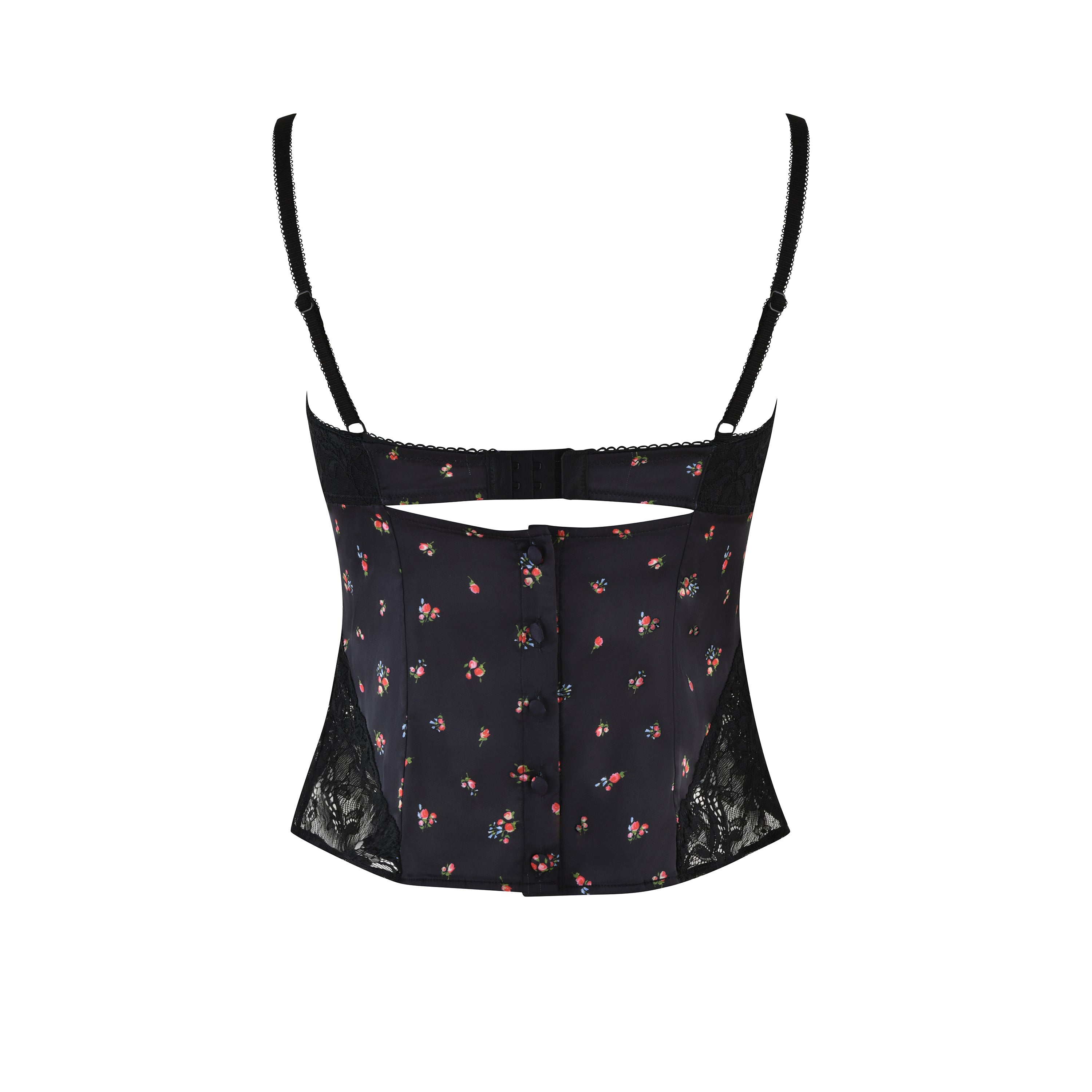The LUELLA CAMI TOP - BLACK : DITSY FLORAL by I.AM.GIA is a black floral corset with adjustable straps, front buttons, and lace detailing. It features a sweetheart neckline and back cutout, blending vintage-inspired patterns with elegant lace accents.