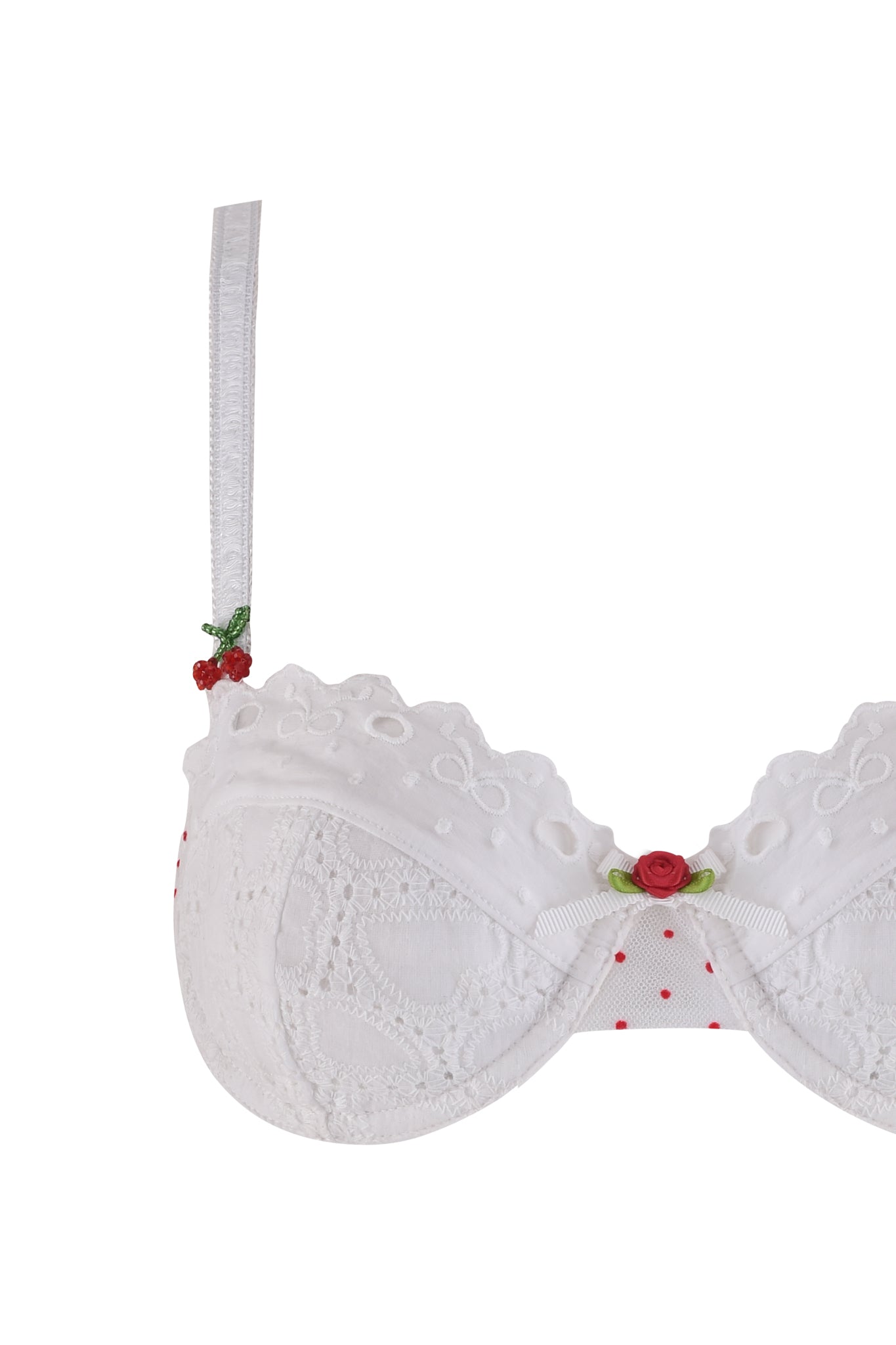 The CHRISSY SET - WHITE by I.AM.GIA is a white lace cotton embroidered bra with red polka dots, scalloped edges, a center red rose with green leaves, cherry detail on one adjustable strap, and supportive underwire.