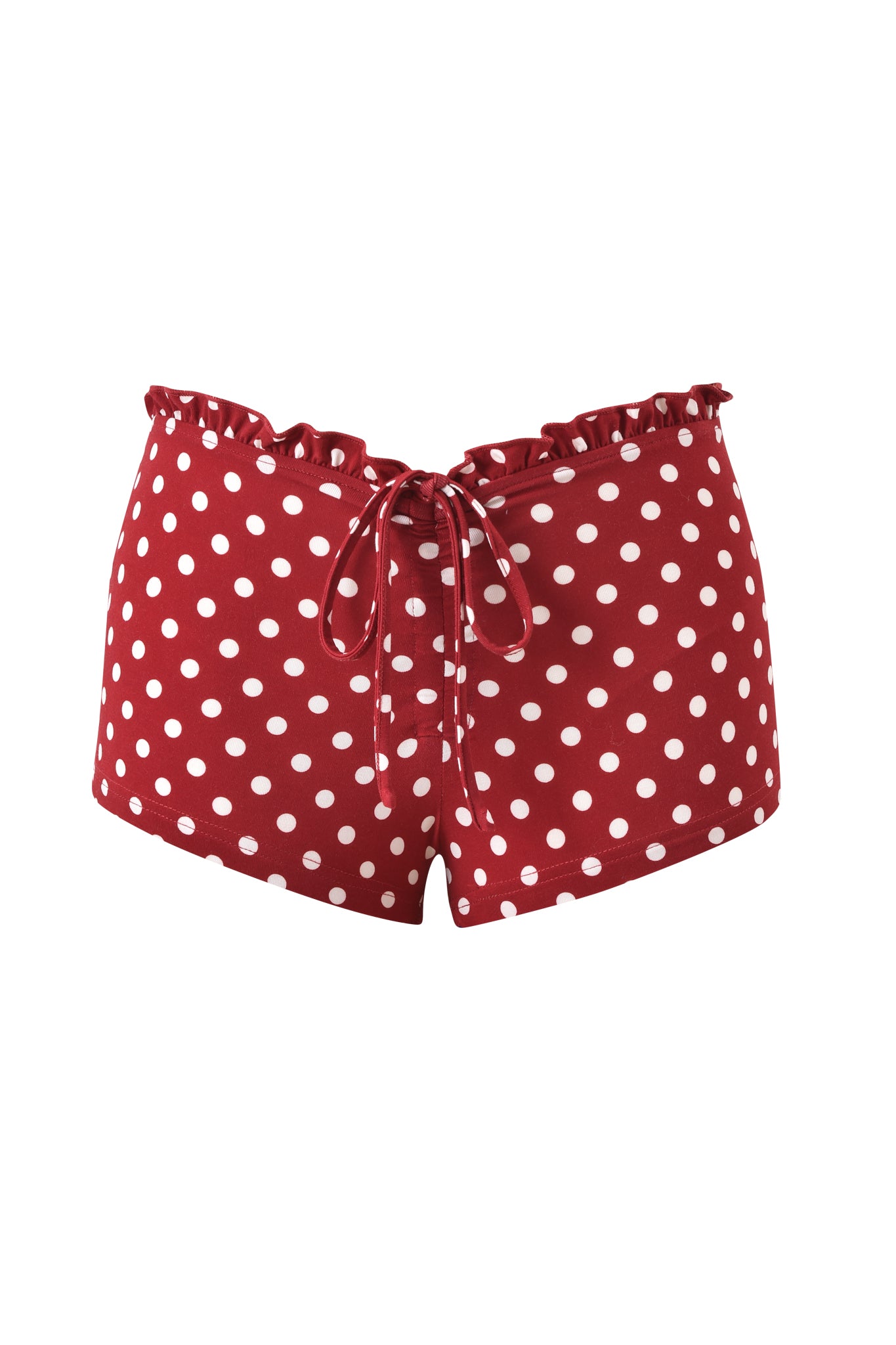 The MELANIE SHORT - RED POLKA DOT by I.AM.GIA features a red and white polka dot print, a ruffled waistband, and a front drawstring tie, shown against a plain white background.