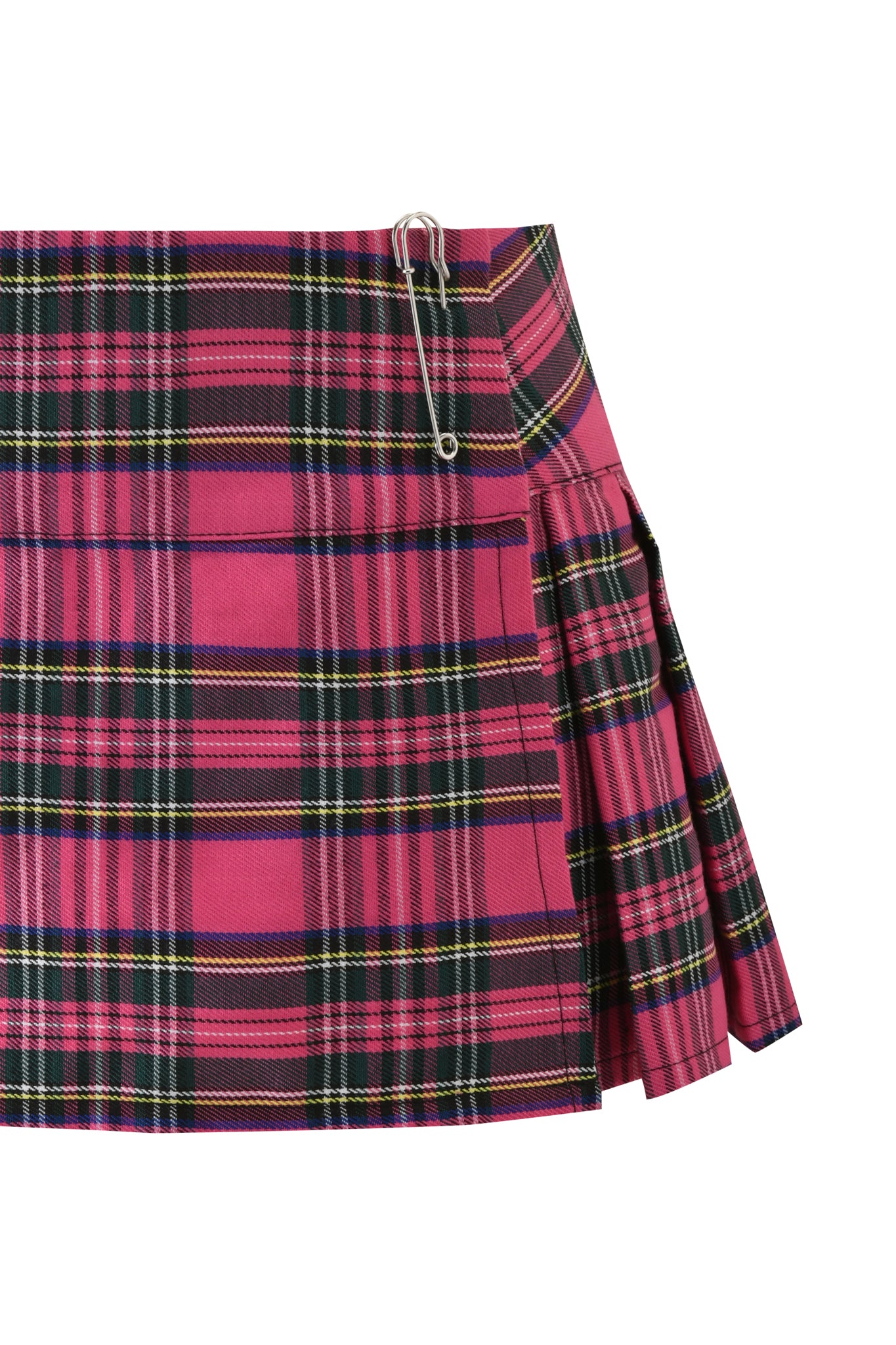 The I.AM.GIA KITTEN MINI SKIRT in pink plaid features classic pleats, a low-rise fit, and a bold safety pin detail at the waistband for a playful, edgy look.