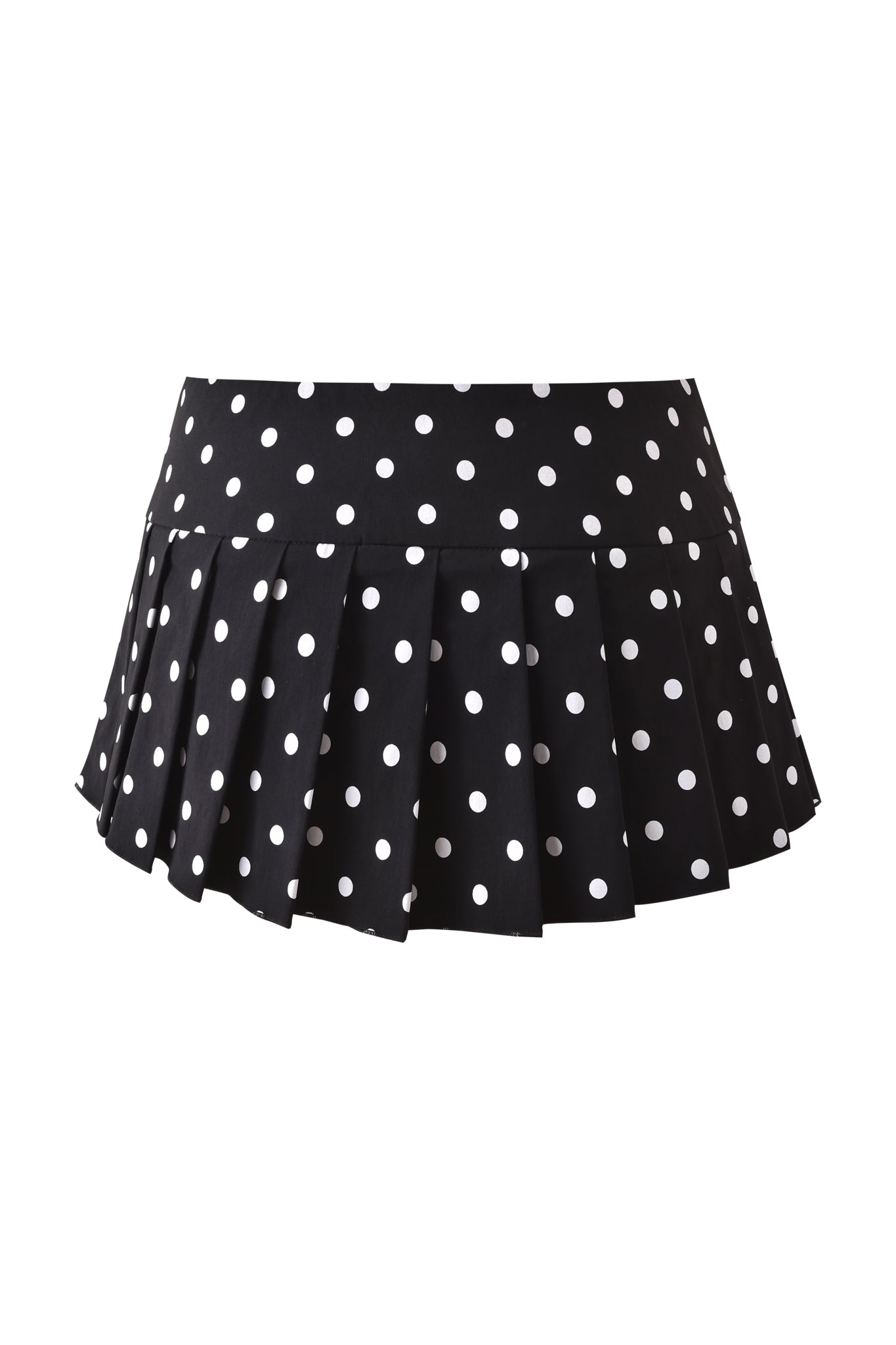 The I.AM.GIA REMINI SKORT - BLACK POLKADOT is a pleated micro mini skort with white polka dots, shown against a white background.
