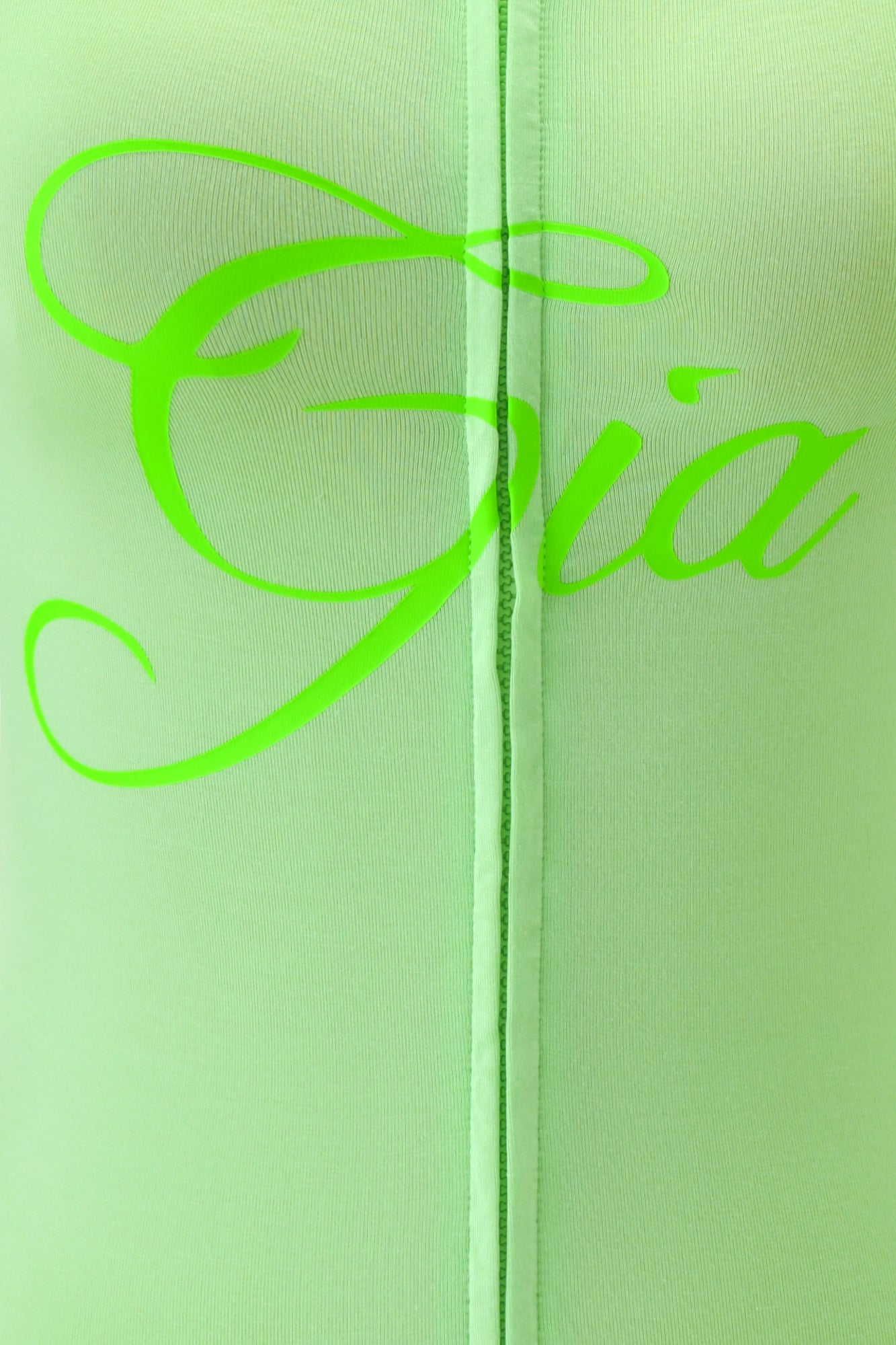 Close-up of neon green BLARE HOODIE by I.AM.GIA, showcasing light green fabric and bold "Gia" script. A central vertical seam accentuates details designed for a bodycon fit.
