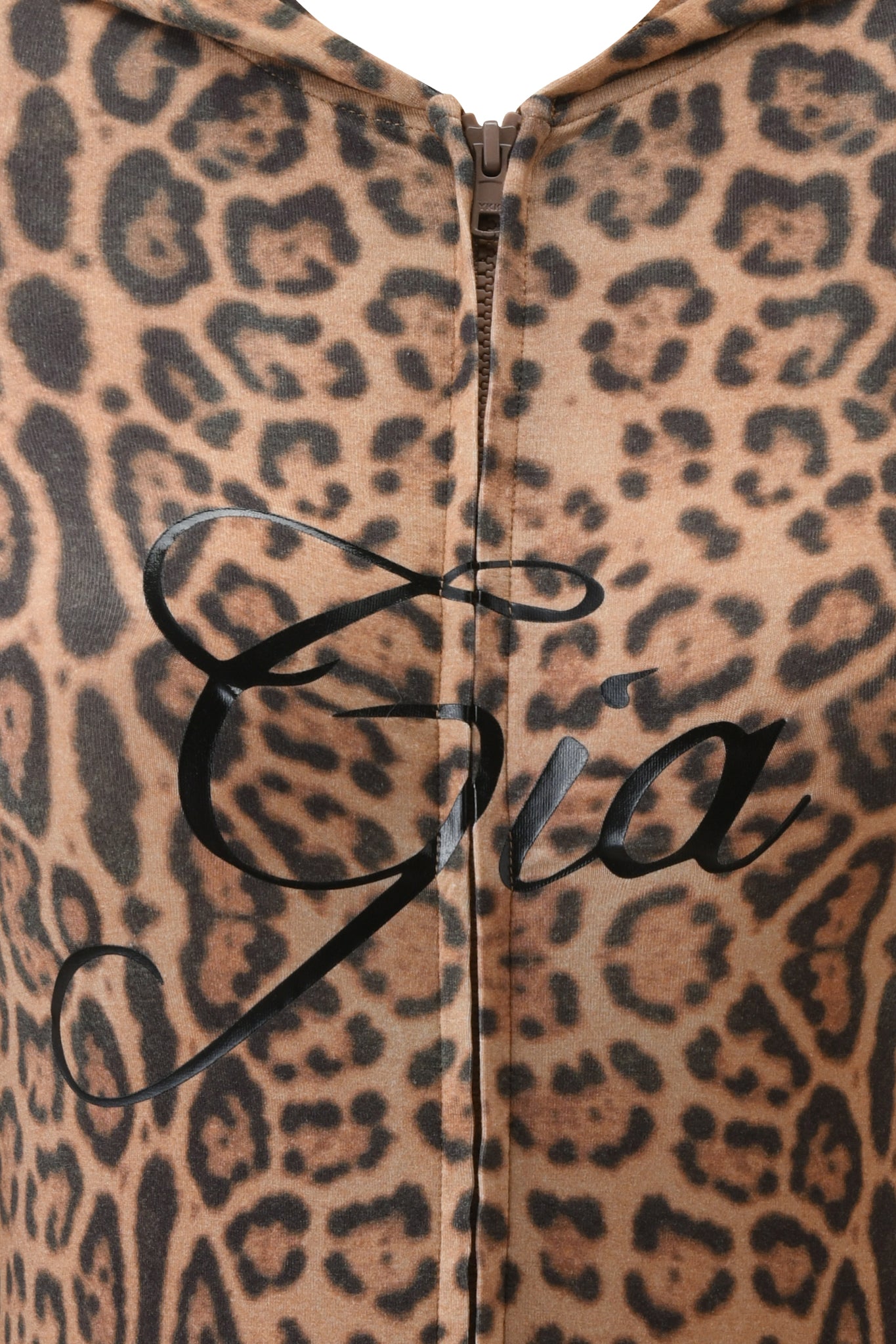 A close-up of the BLARE HOODIE - PANTHERA by I.AM.GIA, featuring a bold brown and black leopard print with "Gia" in large, elegant black script across the front.