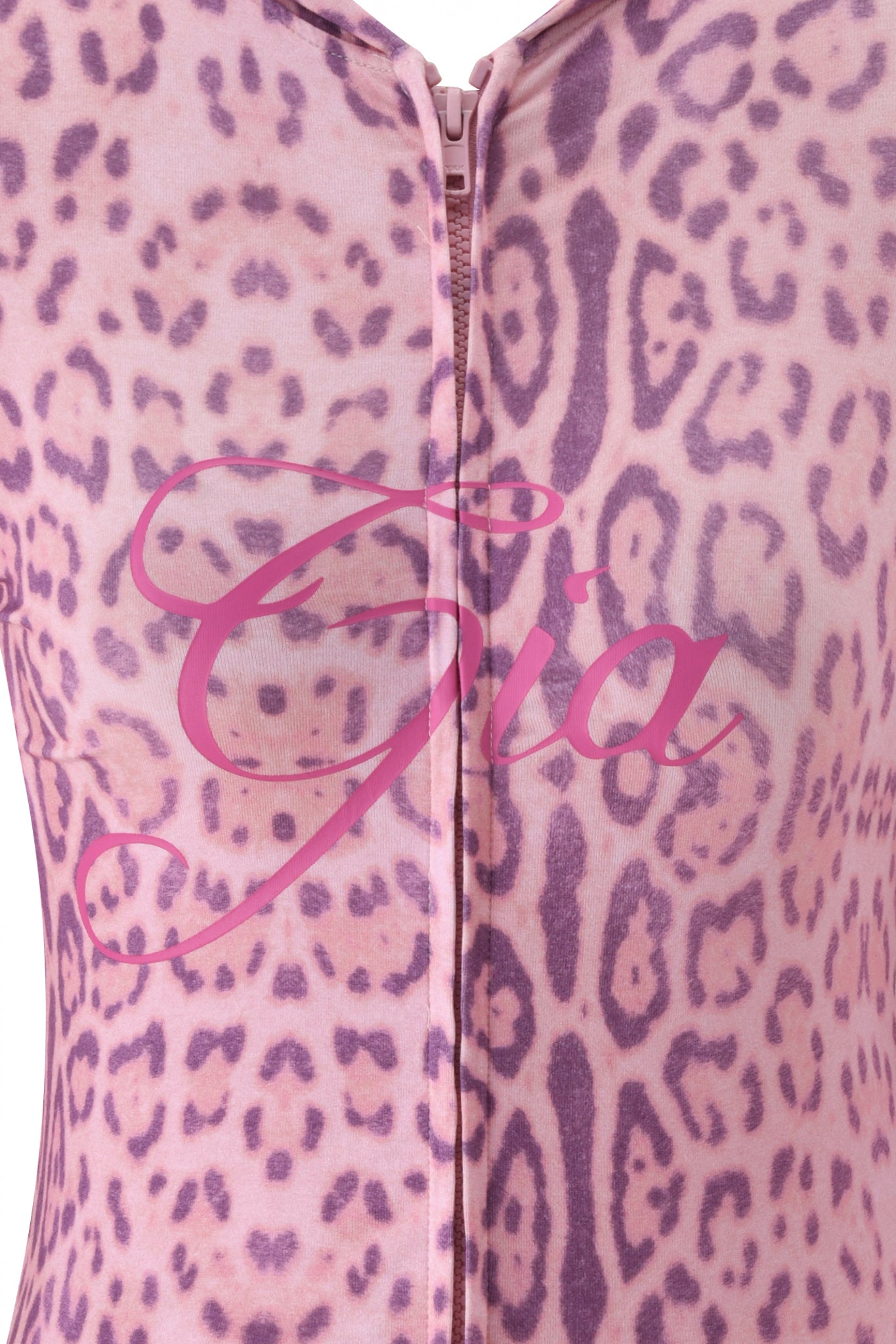 Close-up of the I.AM.GIA BLARE HOODIE - PINK PANTHERA, crafted from soft bamboo viscose, featuring a center zipper and bold pink "Gia" cursive text across the chest.