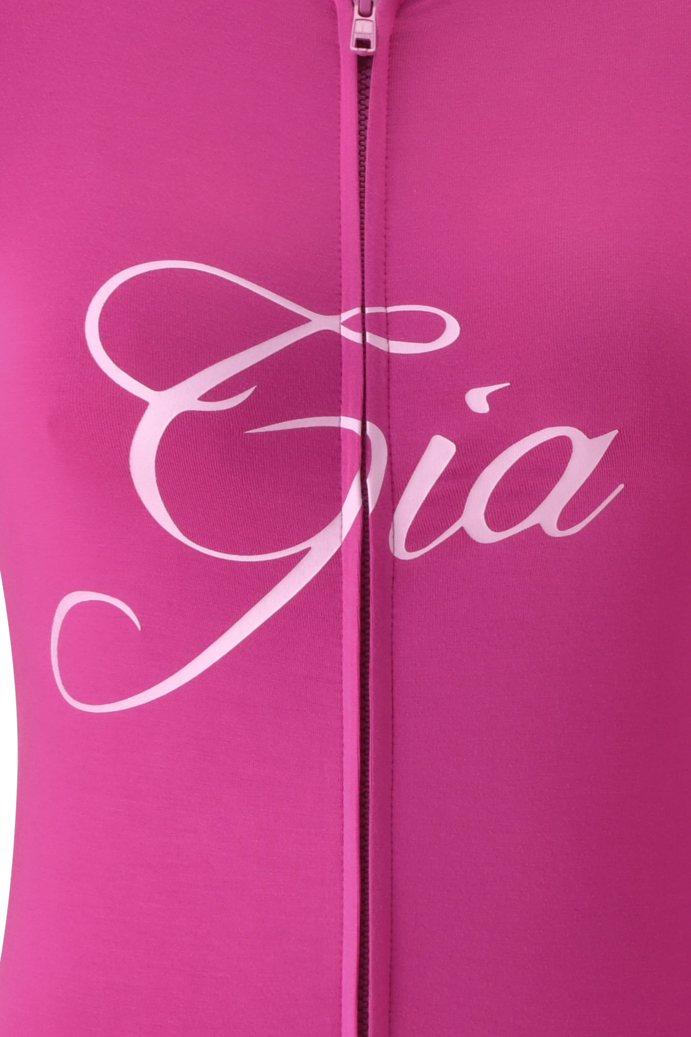 Close-up of a raspberry pink BLARE HOODIE by I.AM.GIA, featuring “Gia” in large, white cursive letters across the chest.