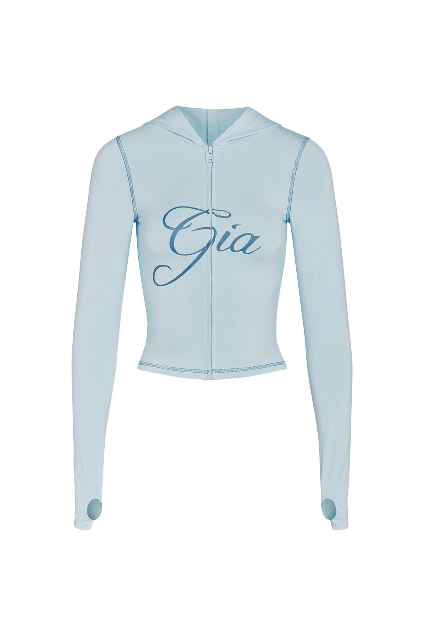 The BLARE HOODIE - BLUE by I.AM.GIA is a bodycon, baby blue zip-up with long sleeves, thumb holes, visible seams, and “Gia” in bold script on the front for a stylish look.