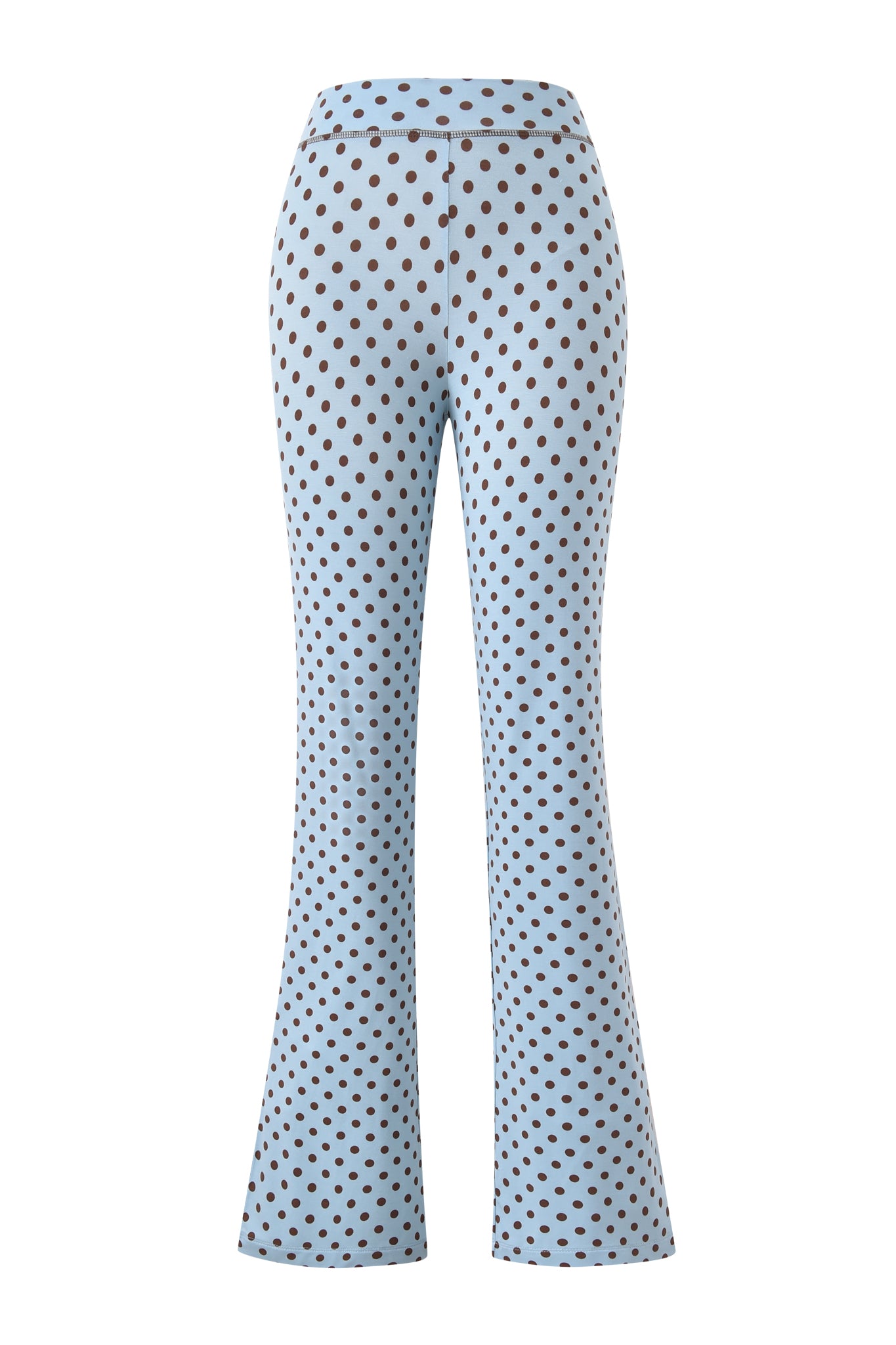 The I.AM.GIA BLARE TRACKPANT - BLUE POLKA DOT features high-waisted, flared light blue pants with black polka dots throughout, shown from the back on a white background.