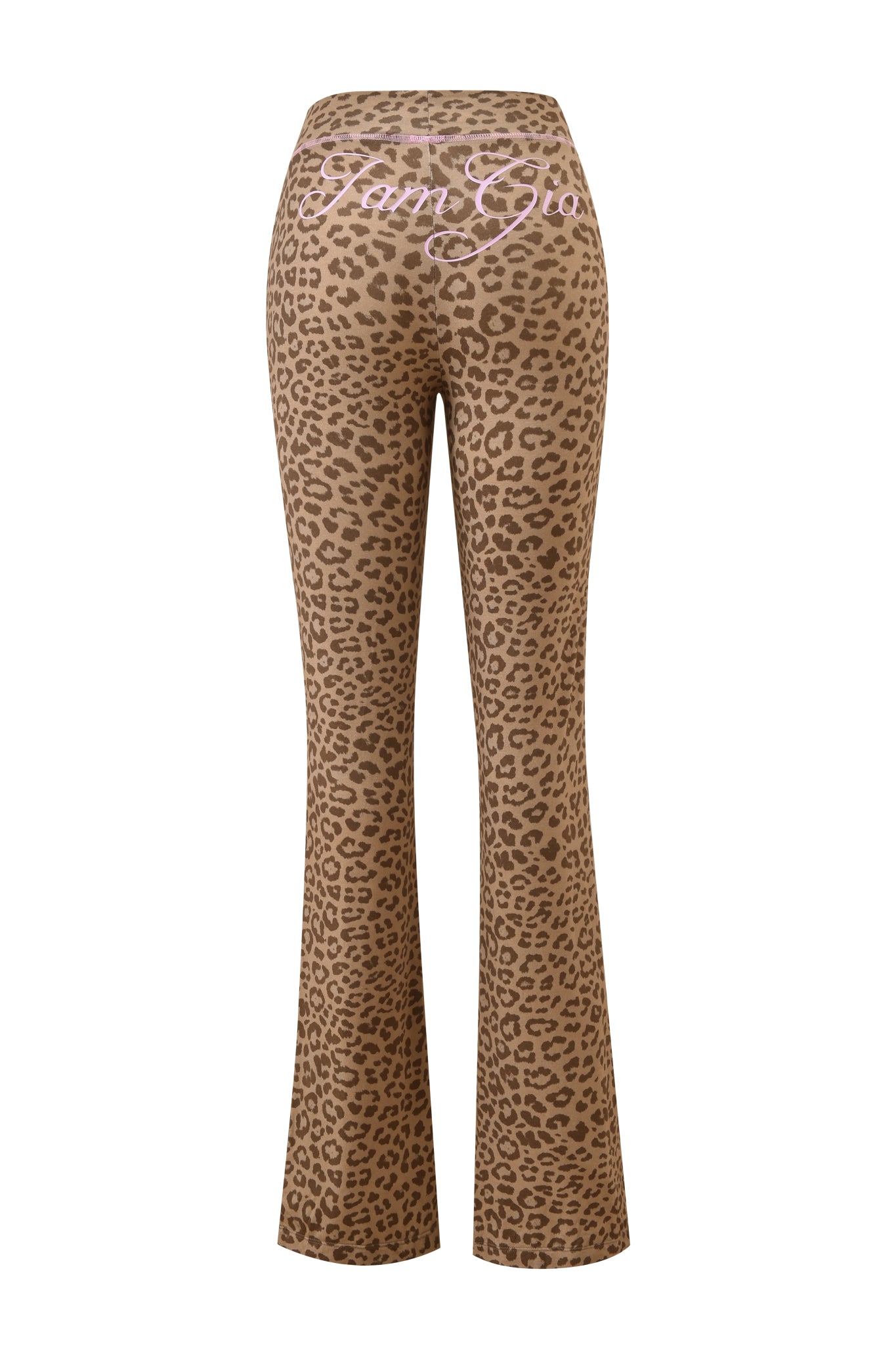 The BLARE TRACKPANT - MOCHA LEOPARD by I.AM.GIA features a mocha leopard print, high waist, flared leg, and "Kim Gio." in white cursive across the upper back. Shown from the back.