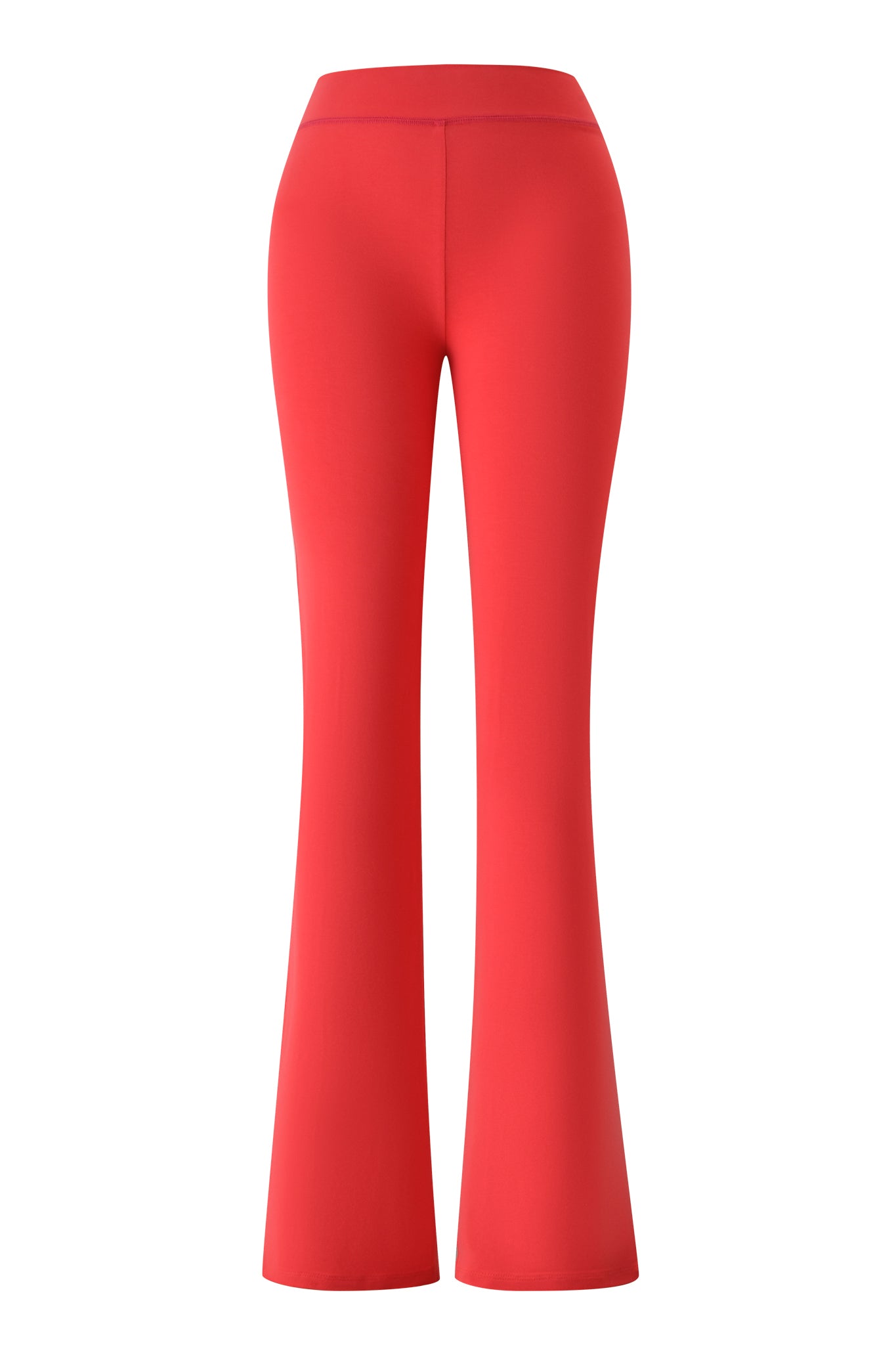 The I.AM.GIA BLARE TRACKPANT - PAPAYA is shown from the back, featuring a high-waisted fit with a smooth, fitted design through the hips and thighs, flaring from knee to hem. Displayed on a white background.